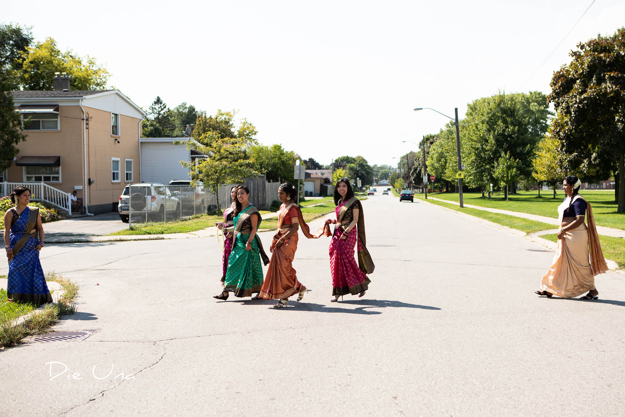 bridesmaids wearing sarees in Toronto crossing the street.jpg