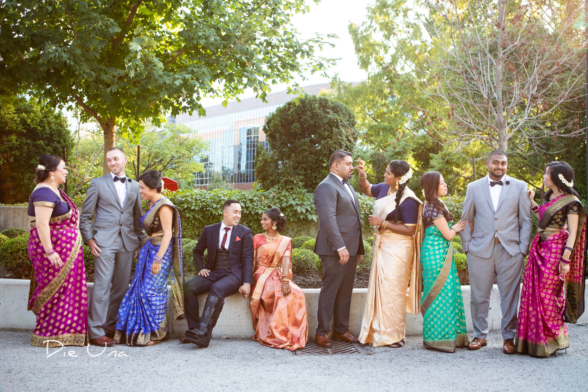 casual portrait of wedding party wearing colorful sarees in Toronto.jpg