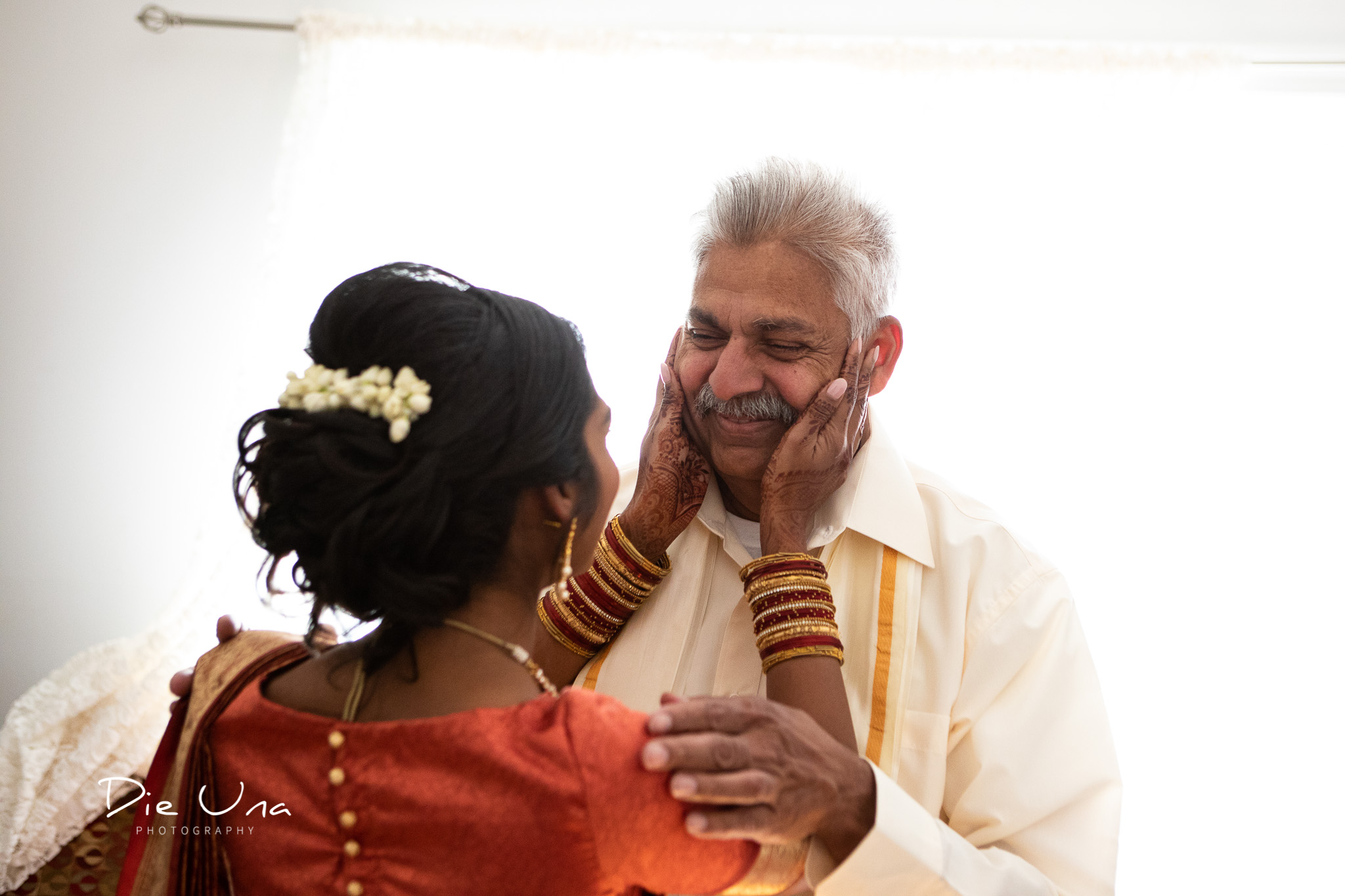 emotional first look with father of the bride.jpg