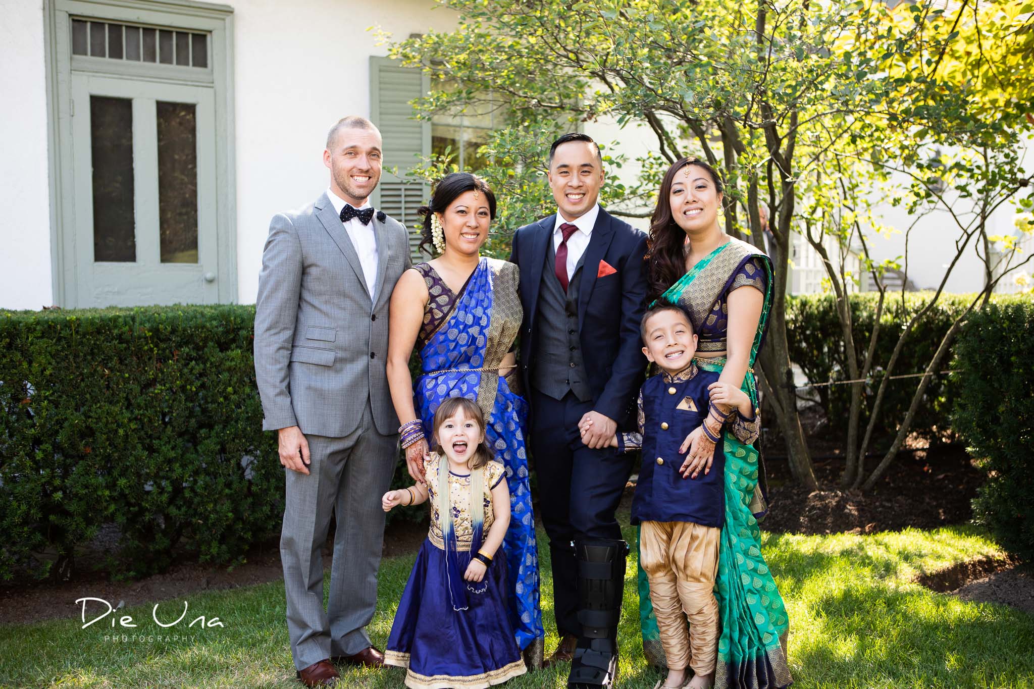 groom family portrait with sisters and neice and newphew.jpg