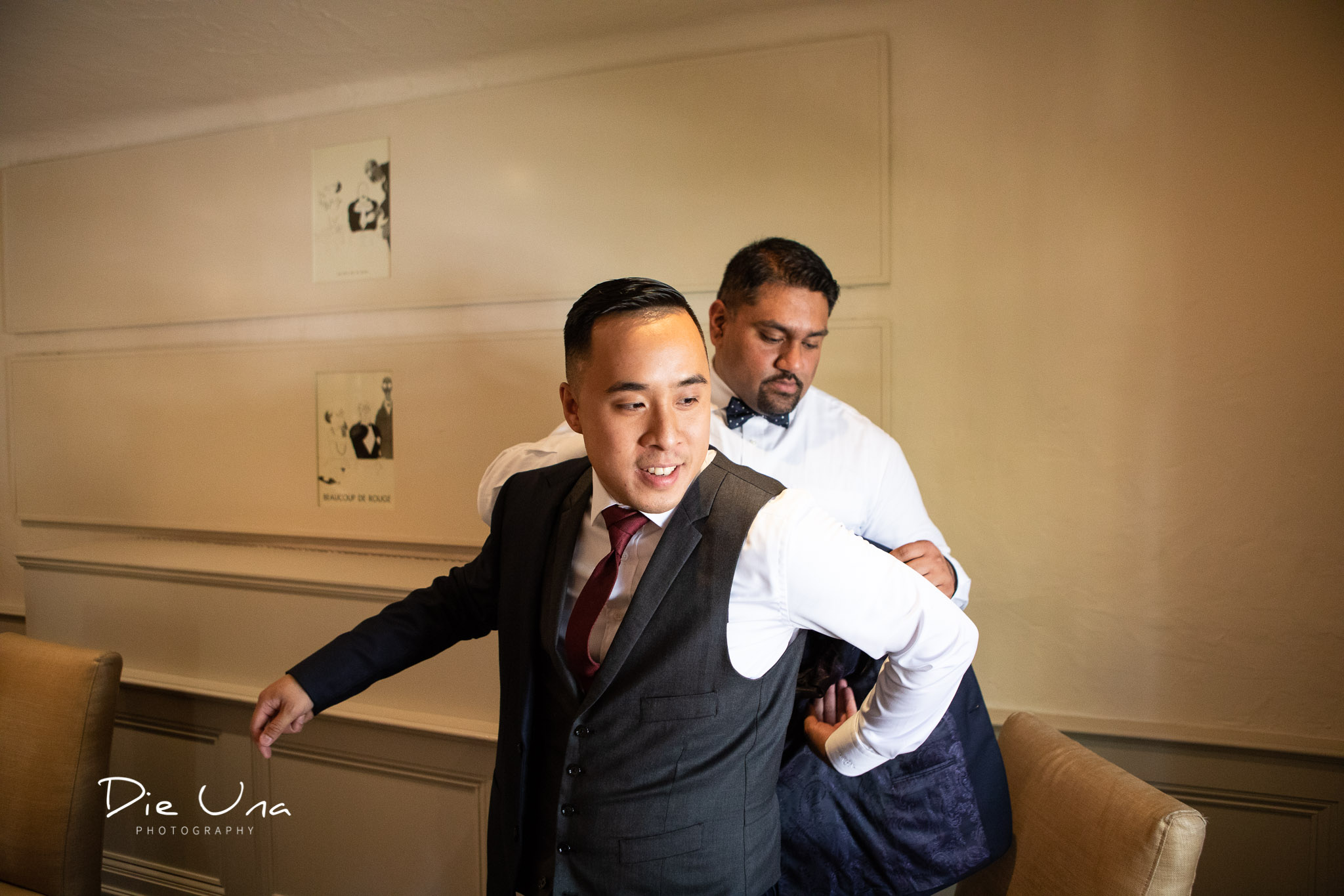 groom getting ready in the Auberge du Pommier in Toronto.jpg