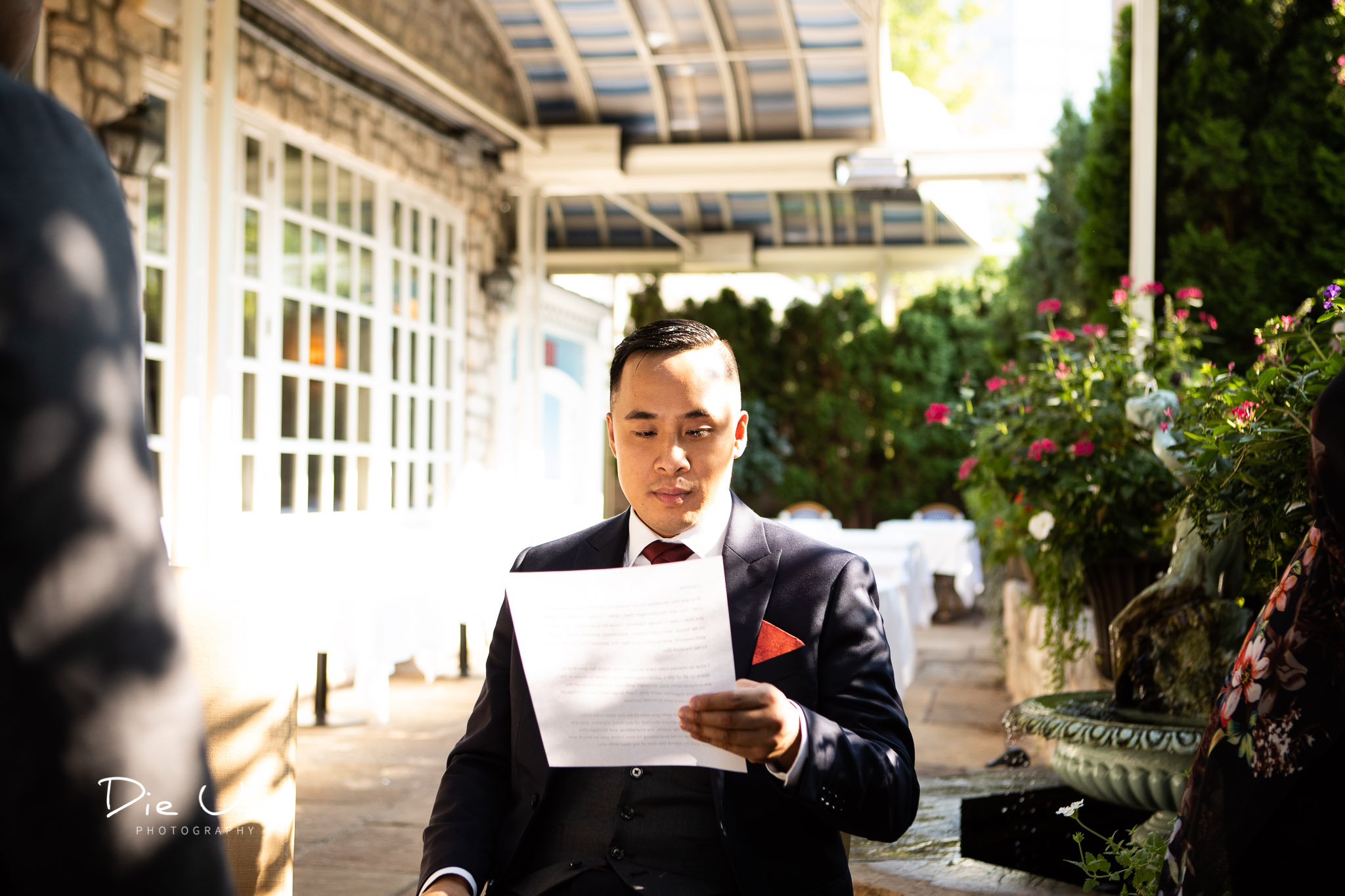 groom reading over his vows just before the ceremony.jpg