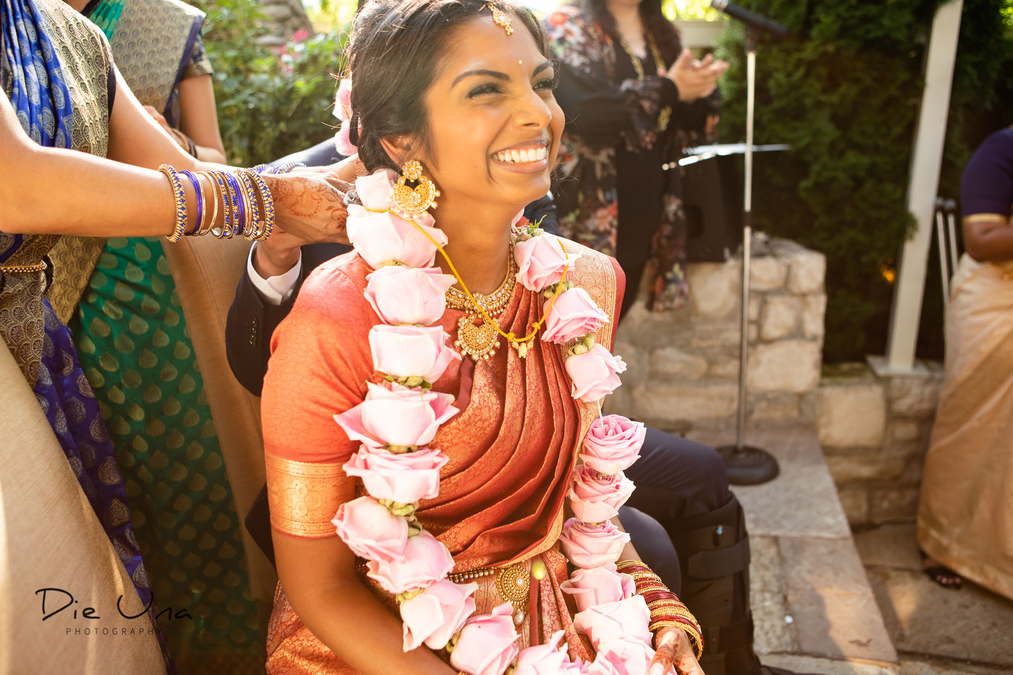 happy bride during the tying of the thaali during Sri Lankan wedding ceremony.jpg