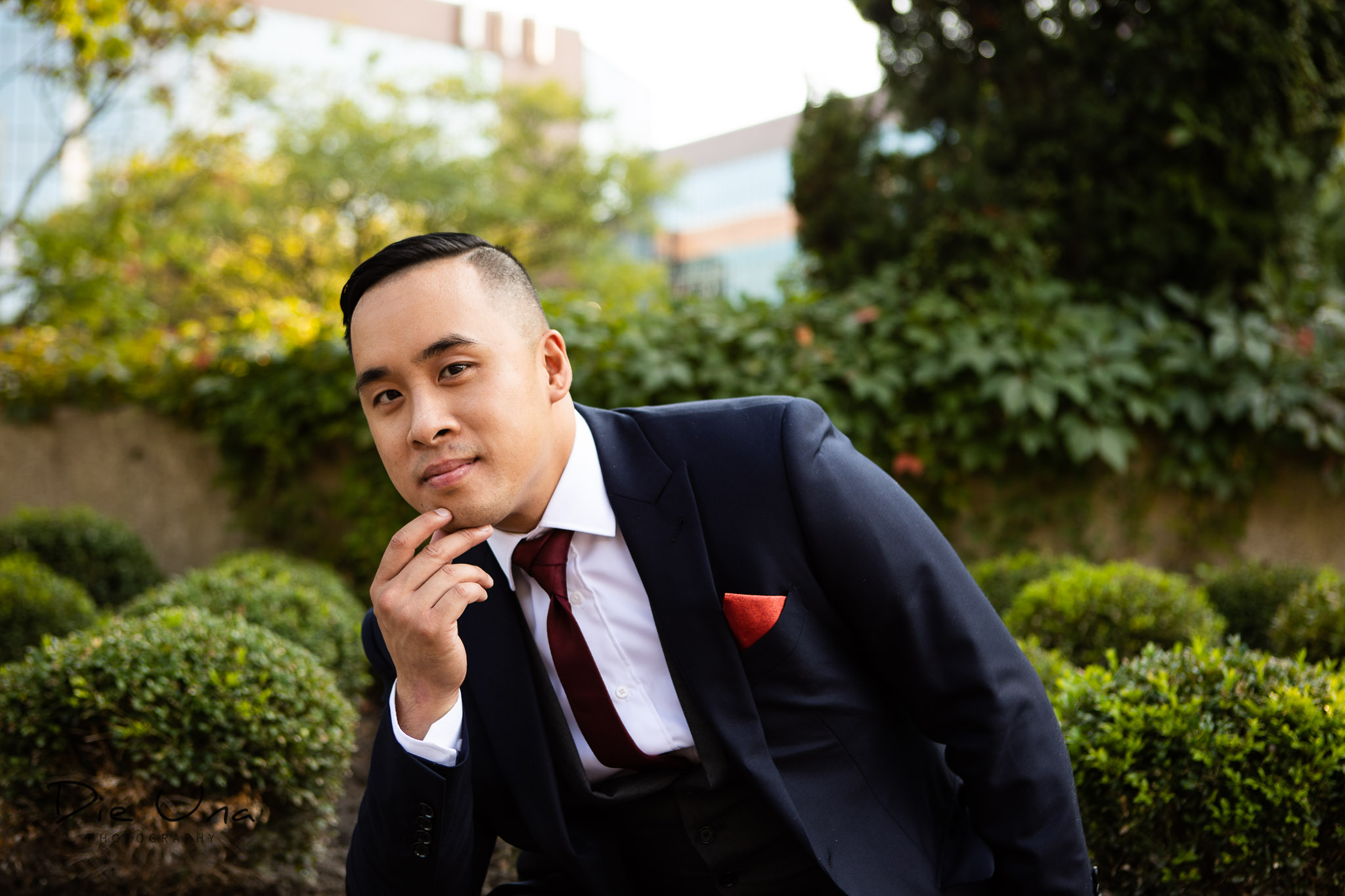 outdoor portrait of groom at the Auberge du Pommier.jpg