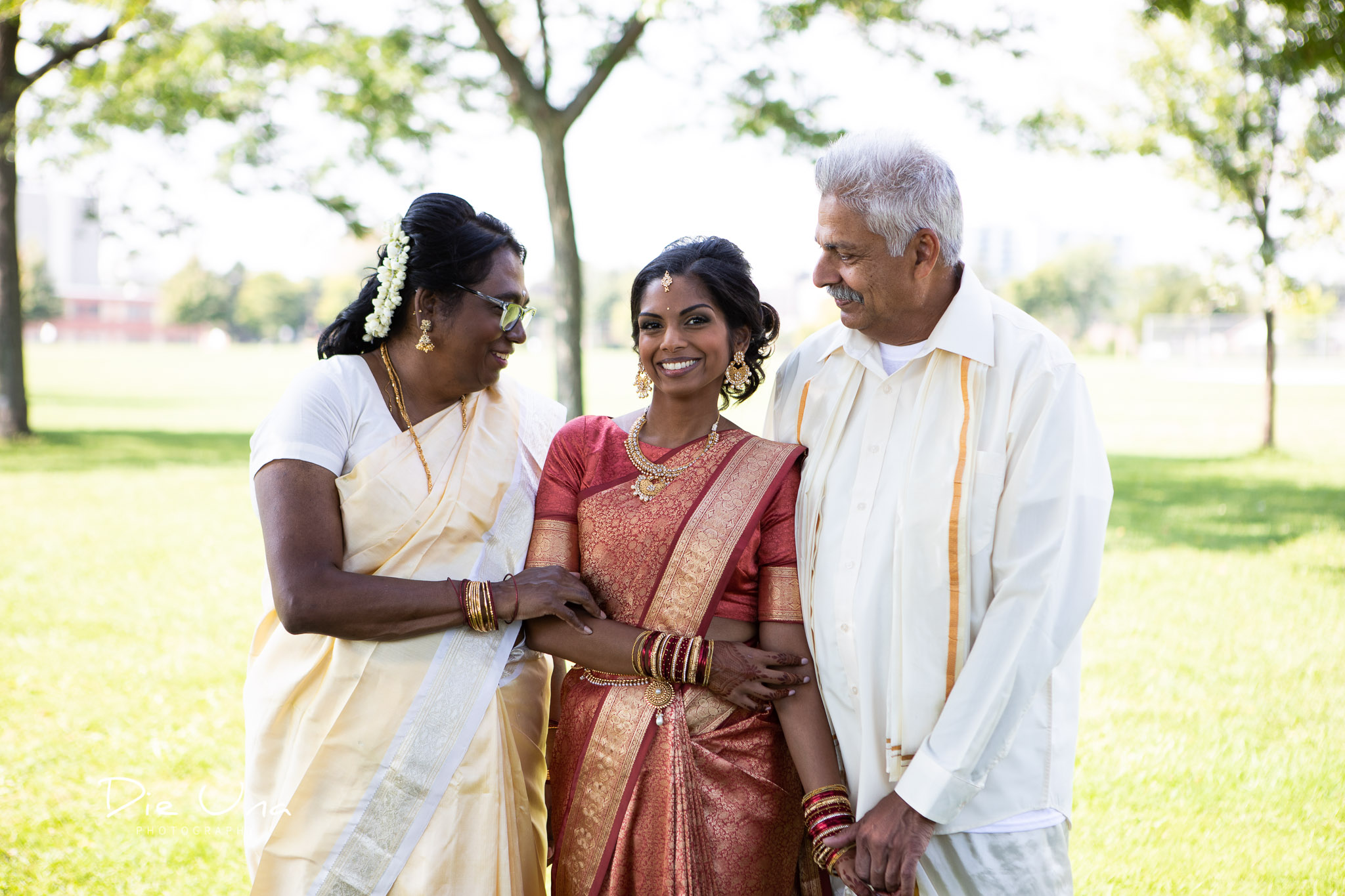 traditional Sri Lankan wedding portrait with bride and parents.jpg