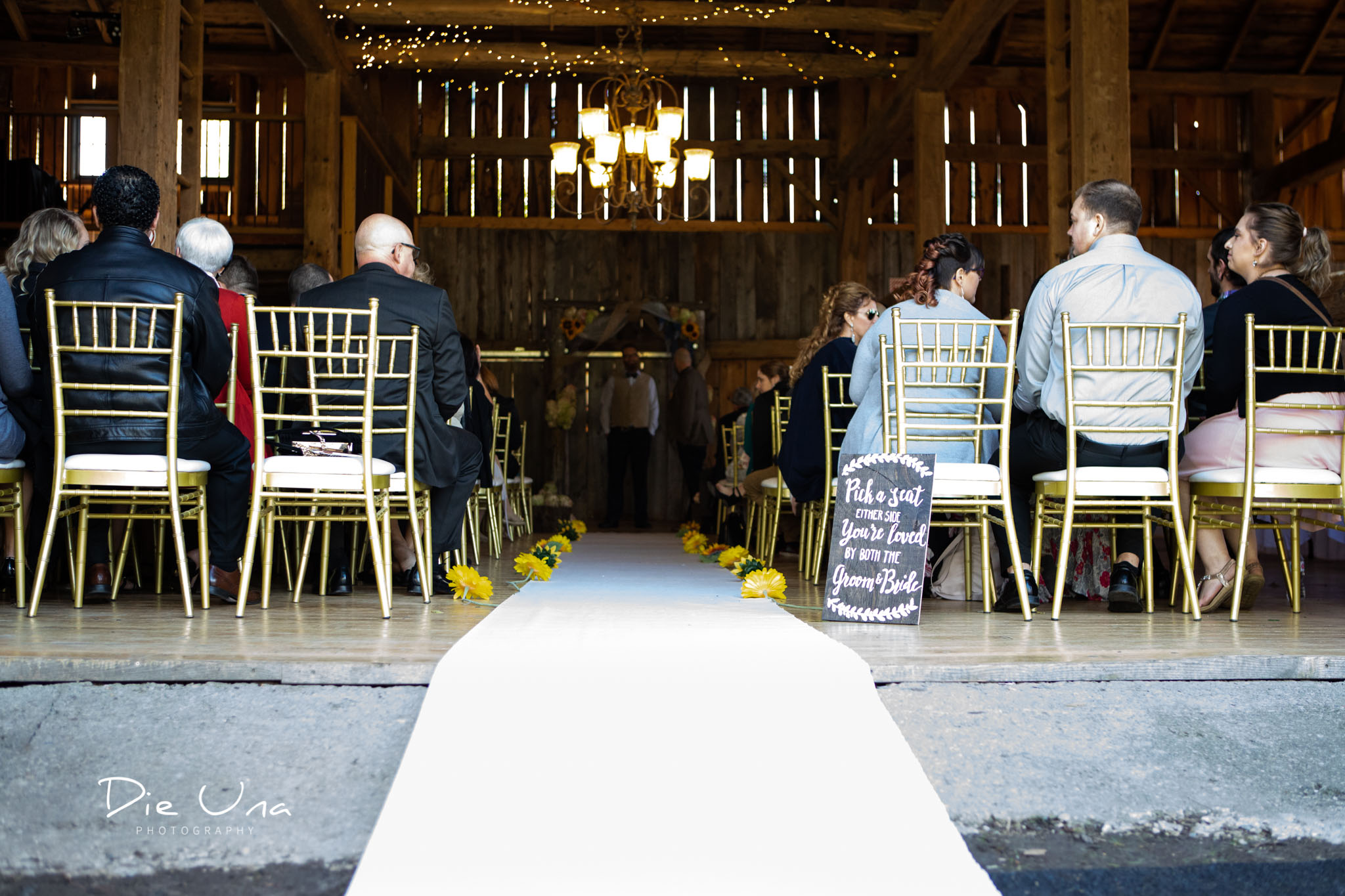 barn wedding for ceremony and white path for bride to walk on.jpg