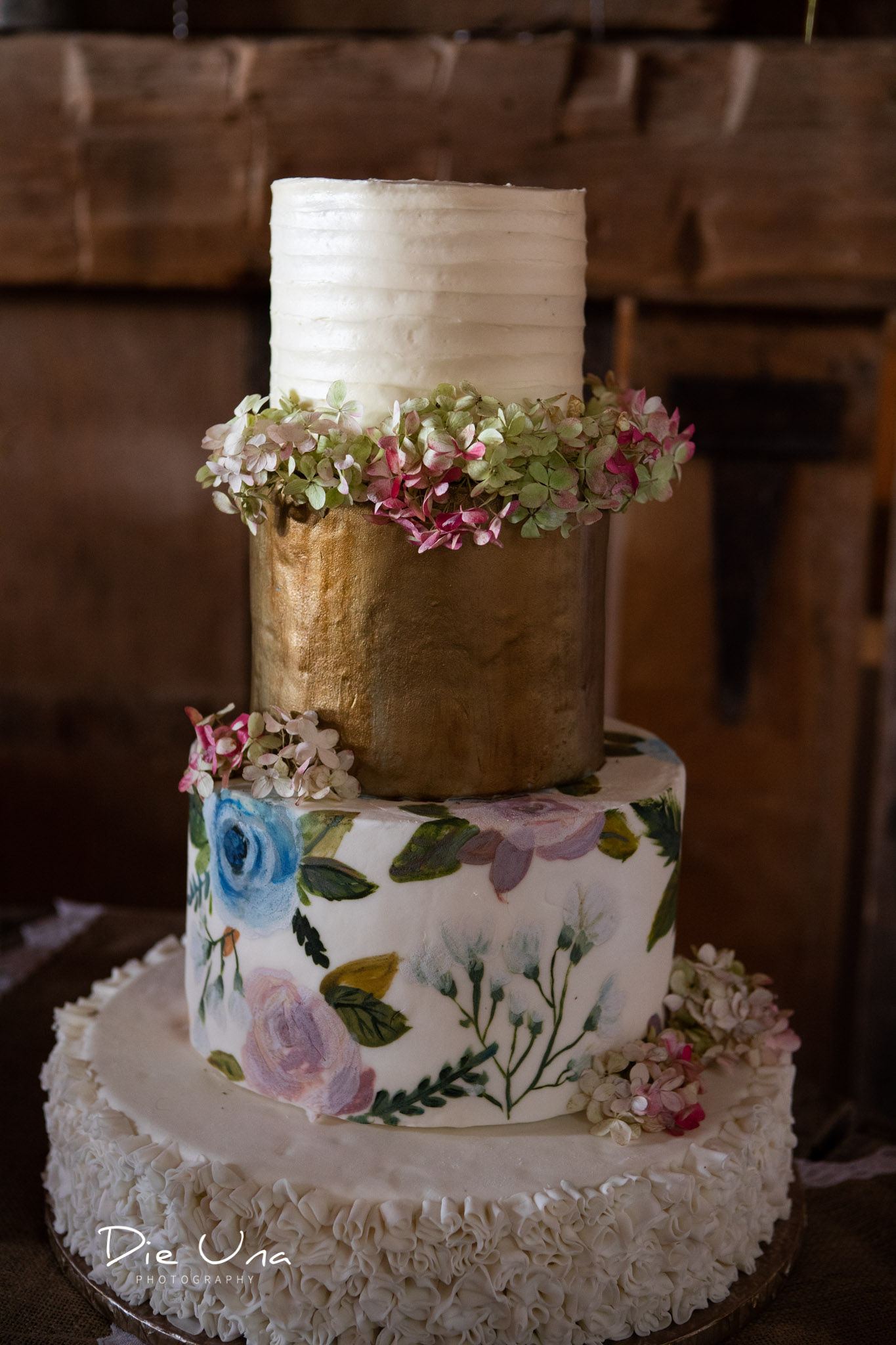 four tier wedding cake made by Jessica Harrison.jpg