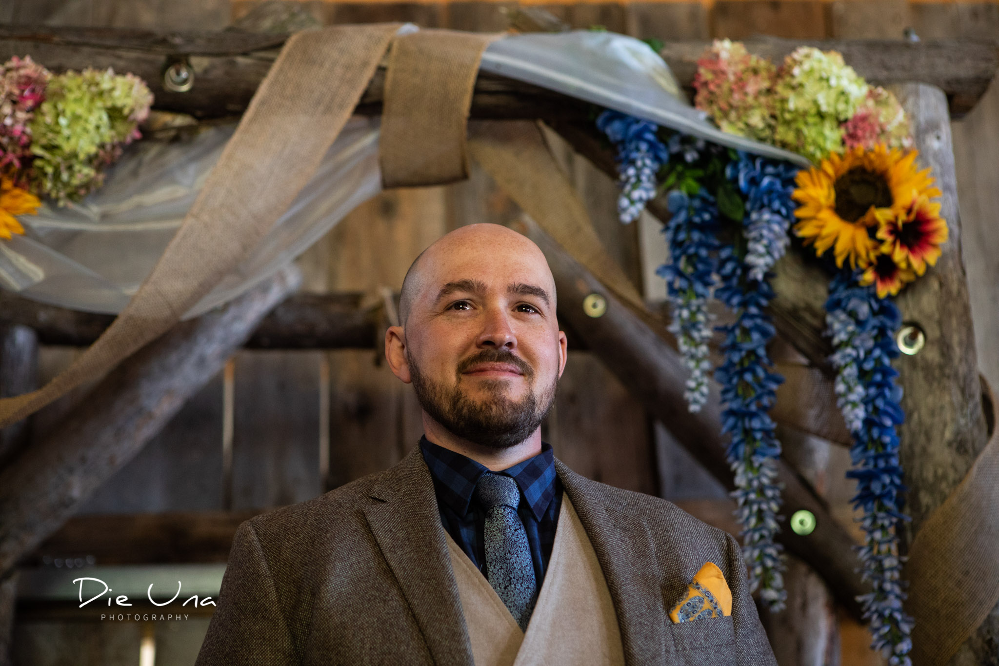groom getting first look during wedding ceremony.jpg