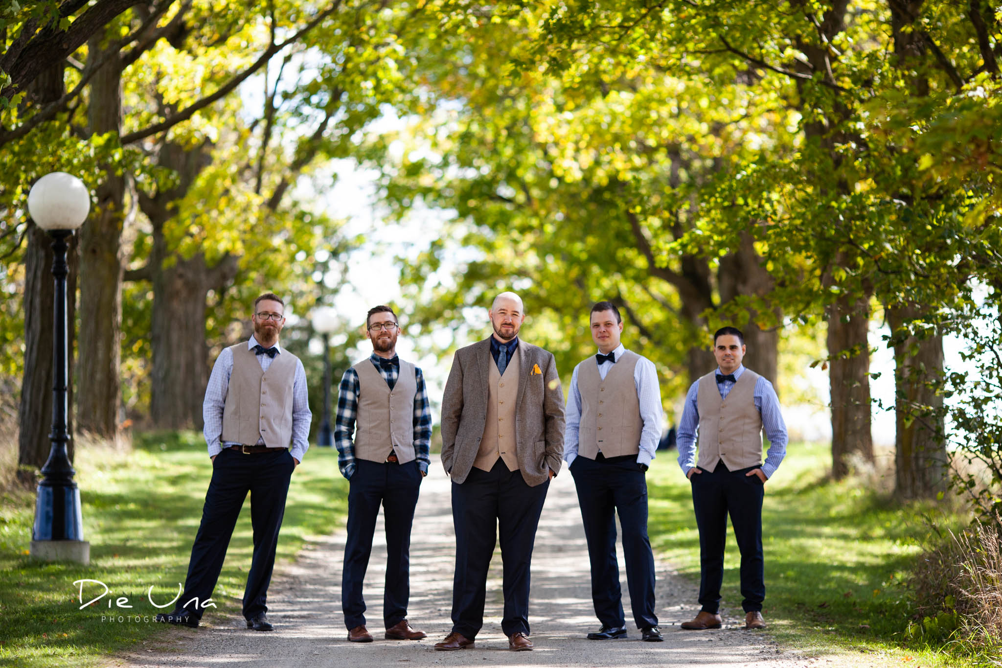 groomsmen and groom posing for wedding portraits .jpg