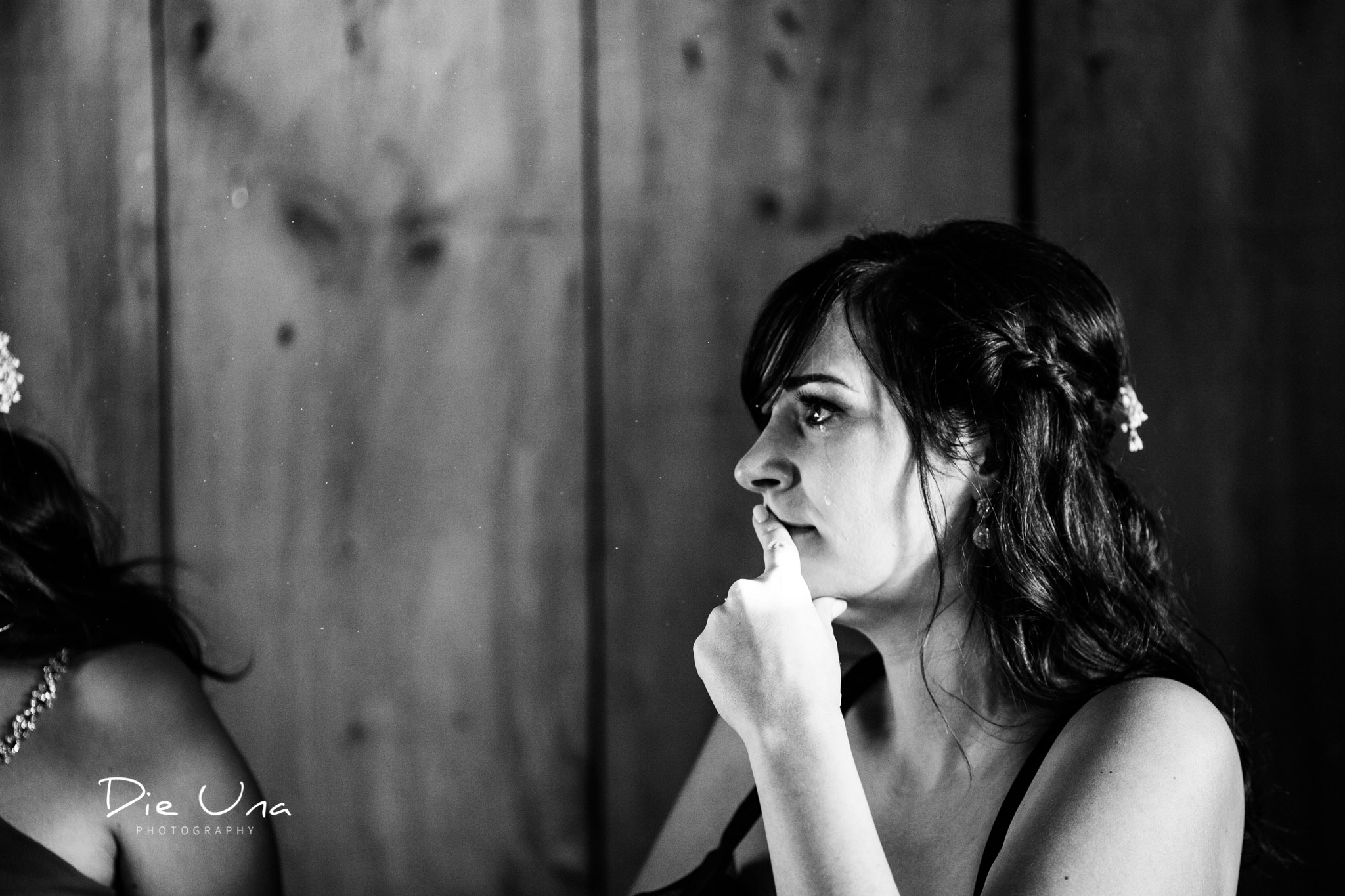 maid of honour with a tear running down her cheek during the brides wedding speech kitchener wedding photographer.jpg