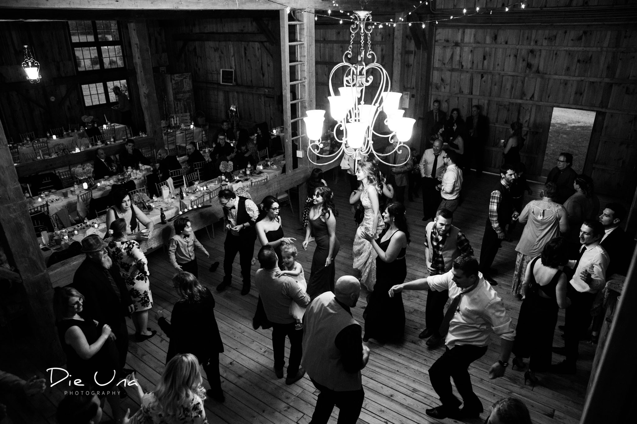 top view of wedding reception guests dancing black and white wedding photography.jpg