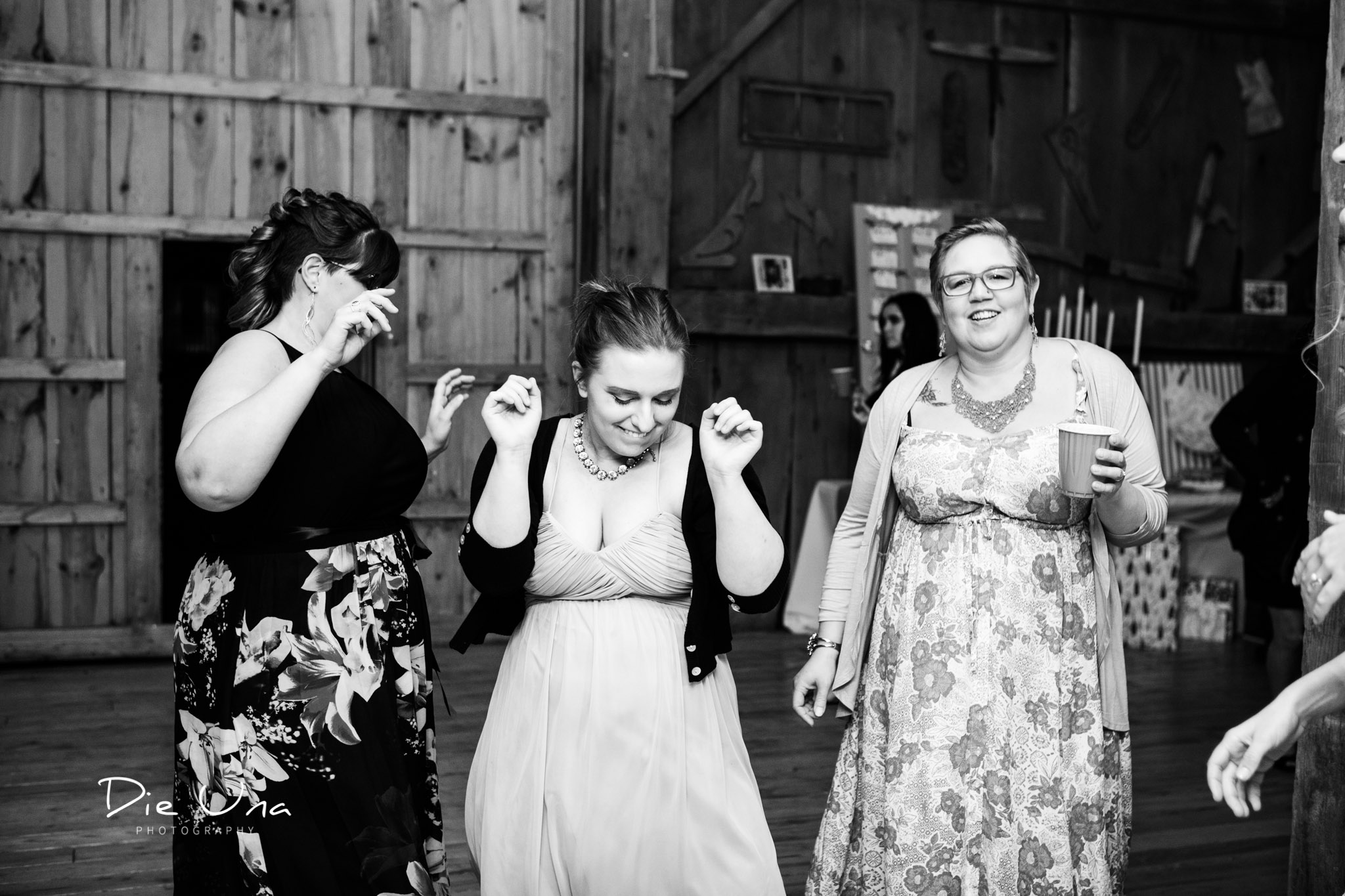 wedding guests dancing during barn wedding reception.jpg