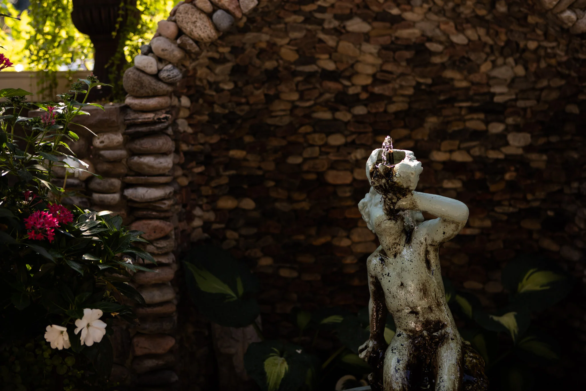 sculpture in the terrace of the auberge du pommier.jpg