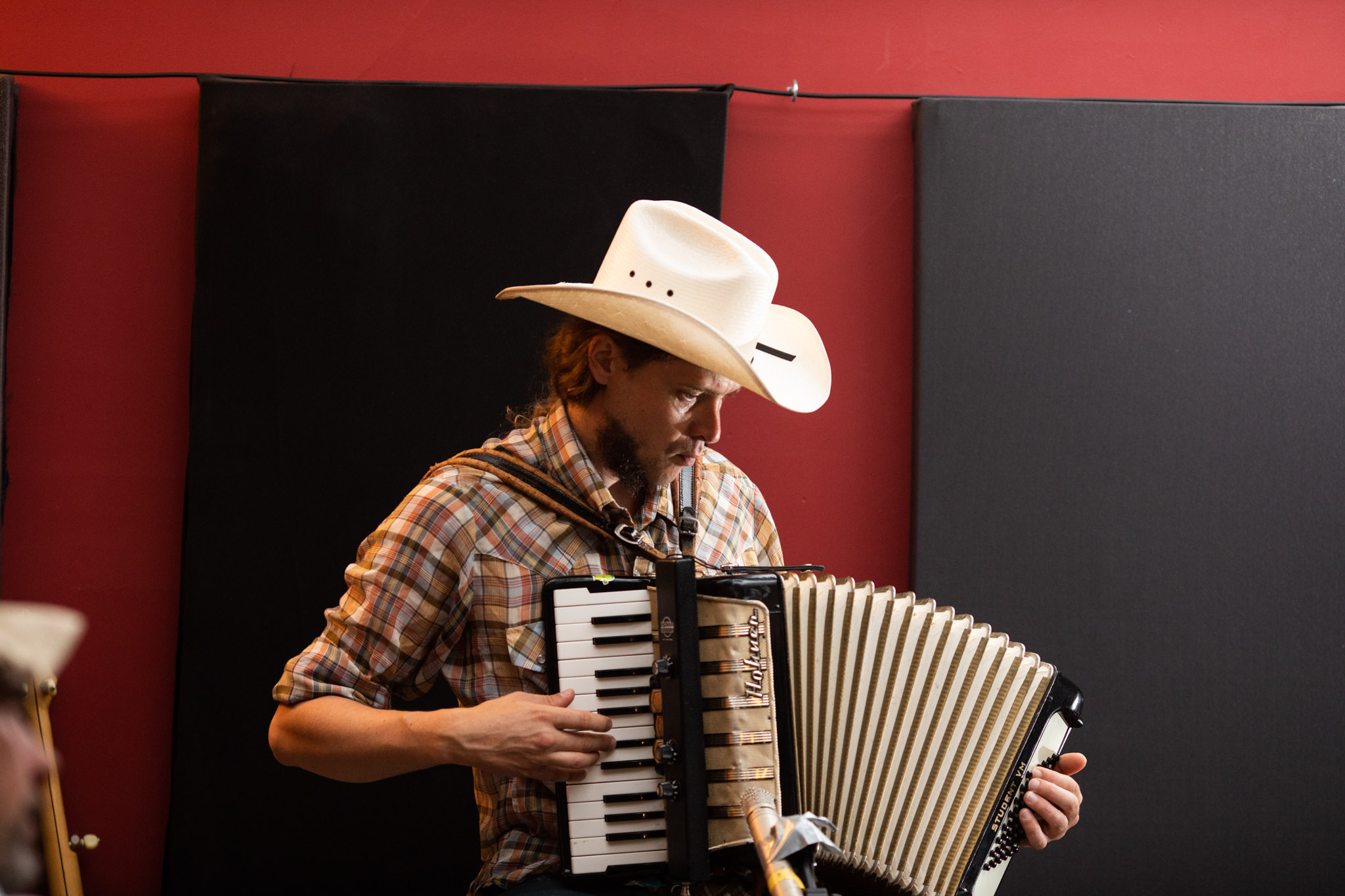 The Mayehmingways playing the accordion at Frederick House Audio.jpg