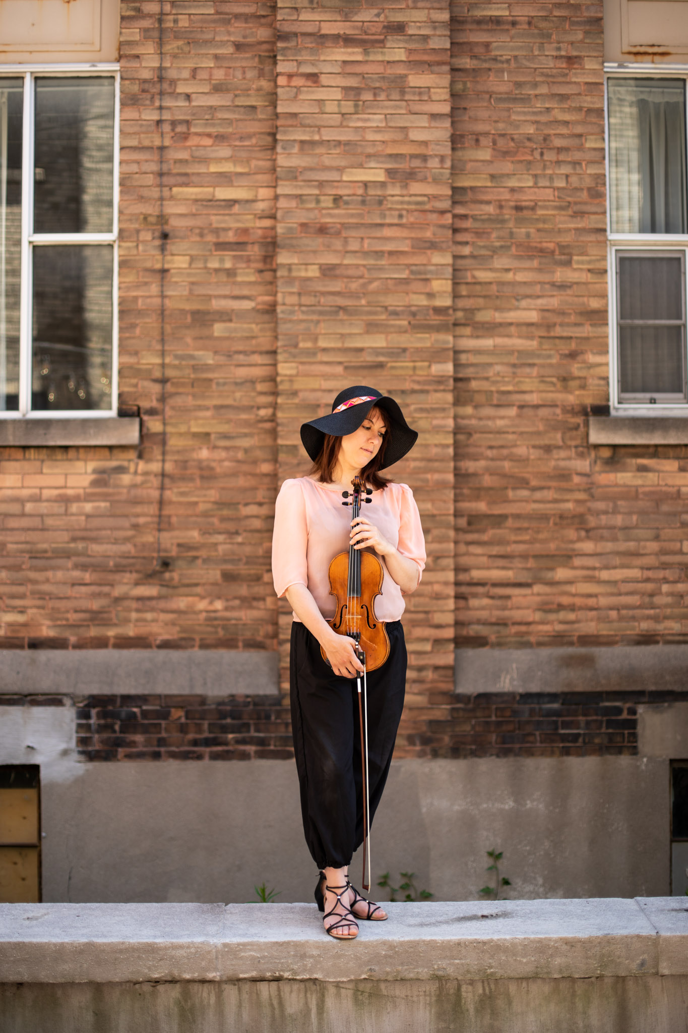 musician photographer Alison and her violin in Goudies Lane in Kitchener.jpg