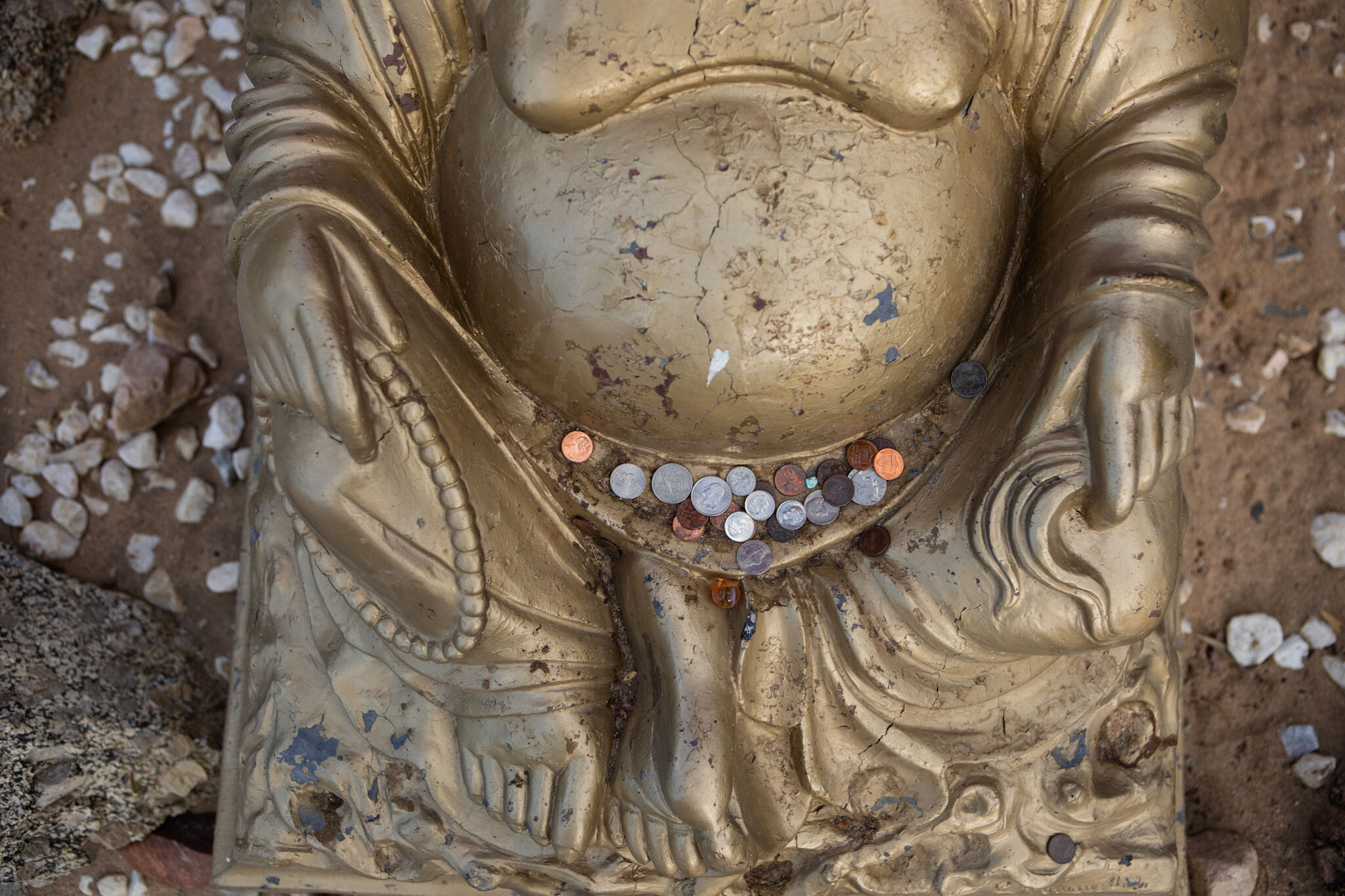 the welcoming Budha with wishers coins in Joshua Retreat Center.jpg
