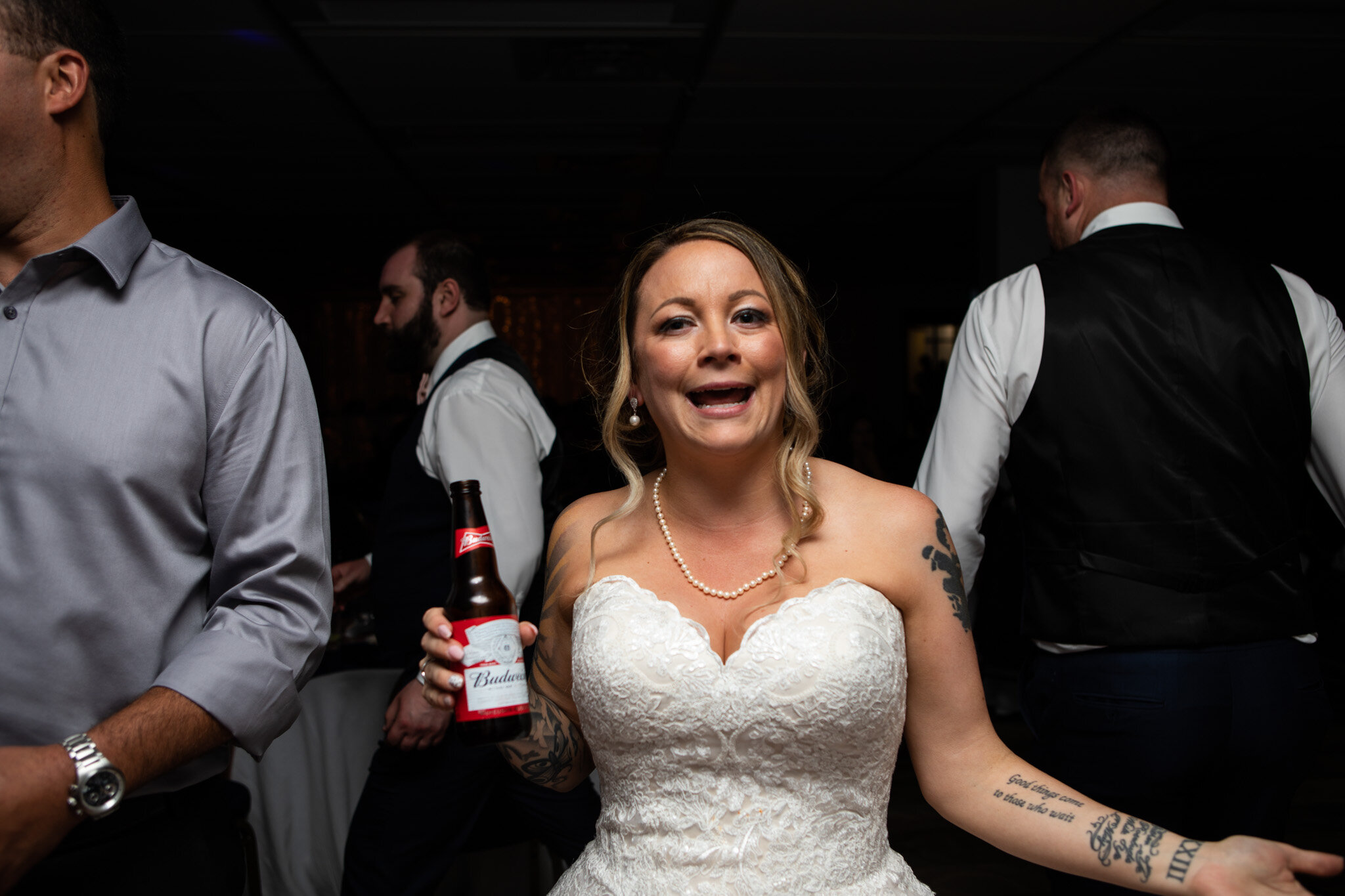bride giving photographer a funny face during reception dancing.jpg