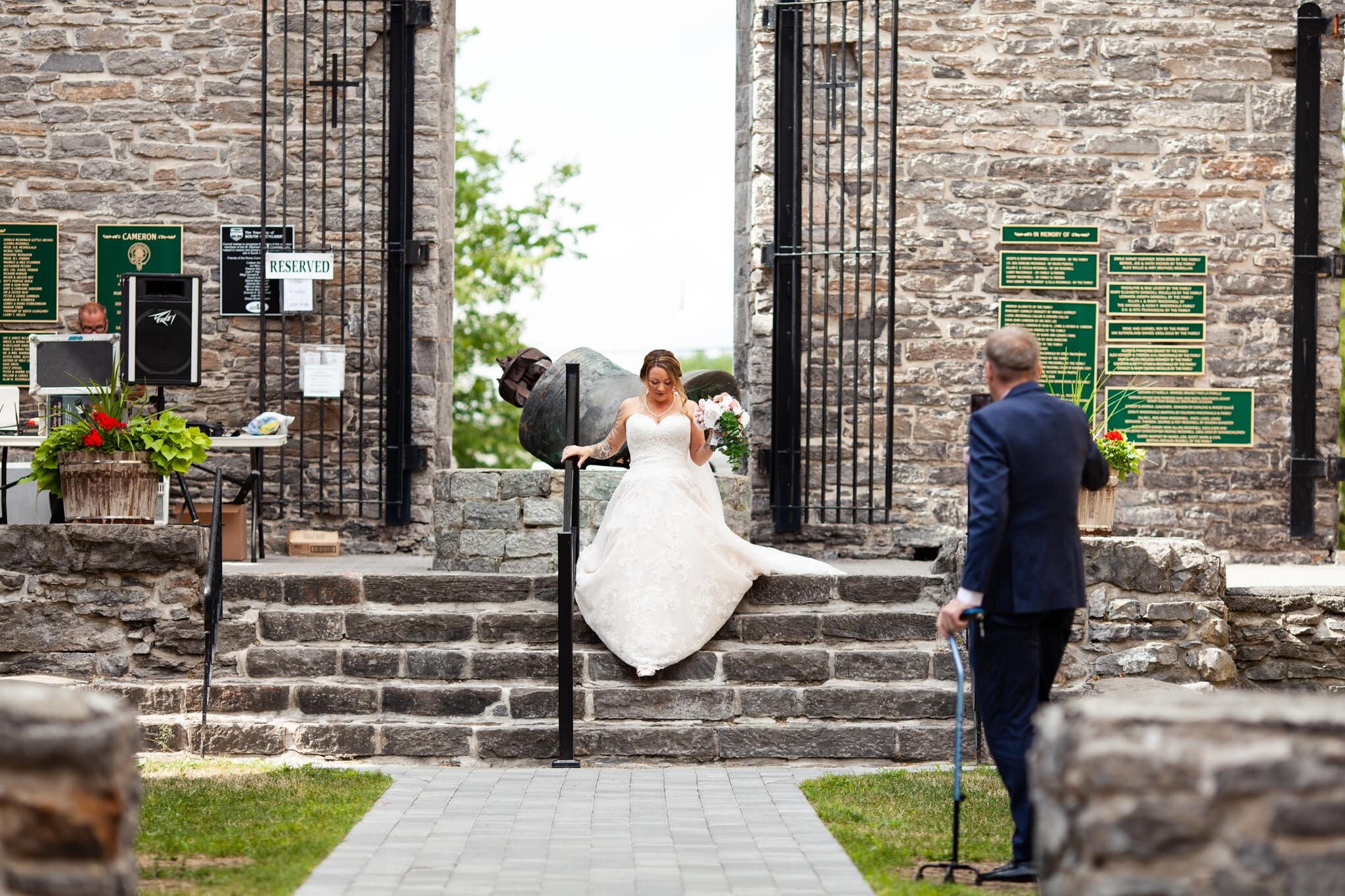 bride walking down the aisle with father at St Raphael's Ruins.jpg