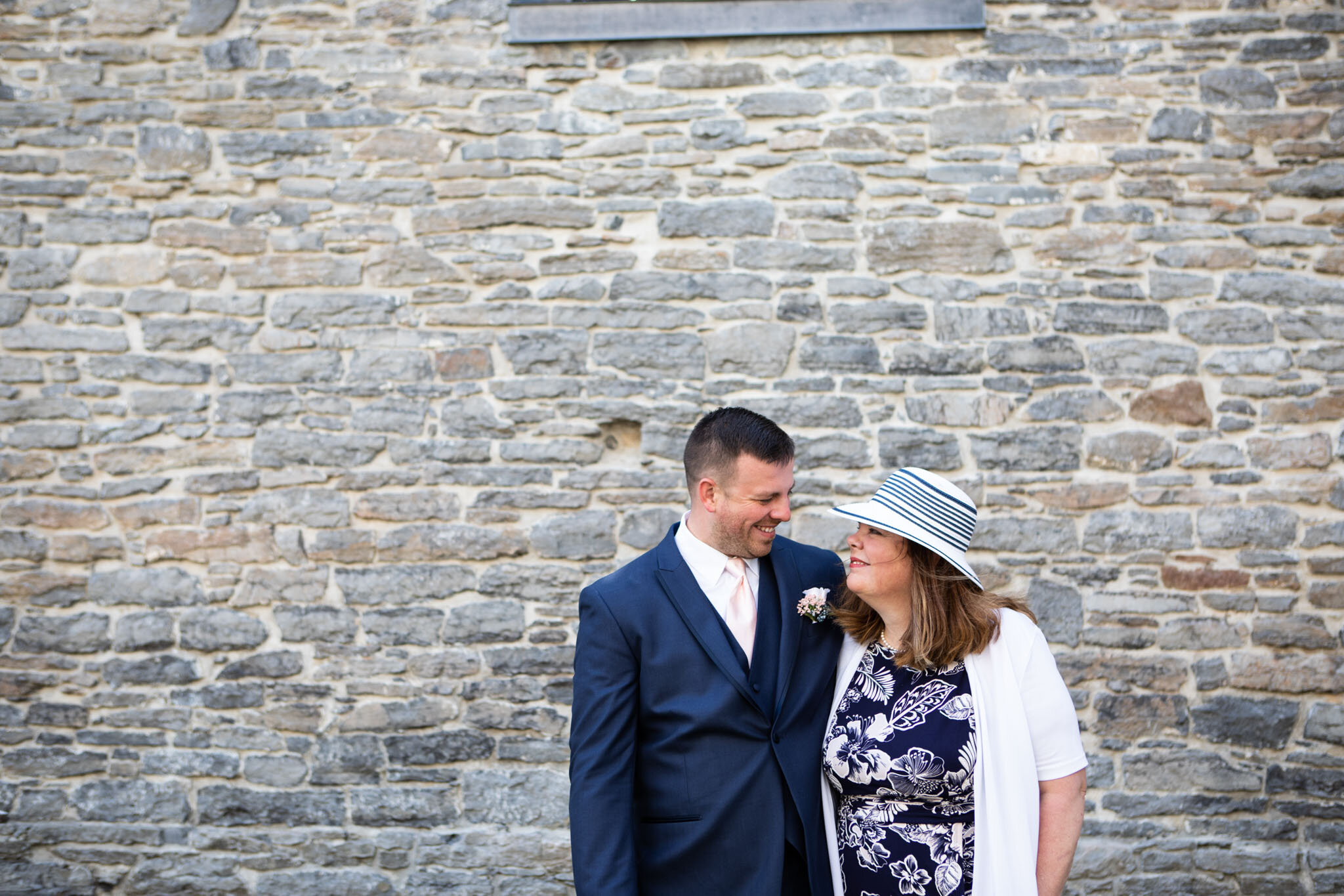 groom with mother in St Raphael's Ruins.jpg