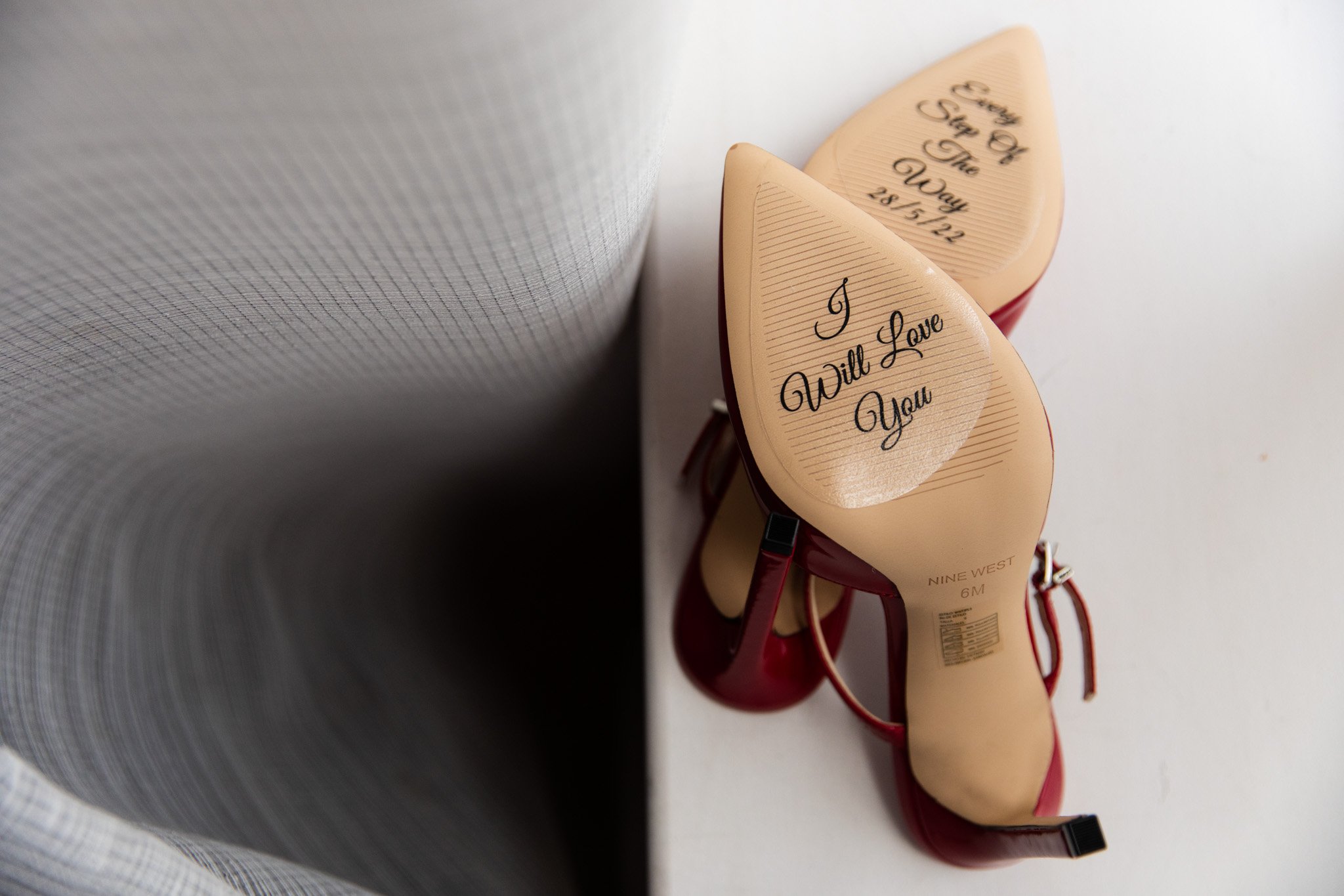 bottom of Bride's heels with a love message from her wife.jpg