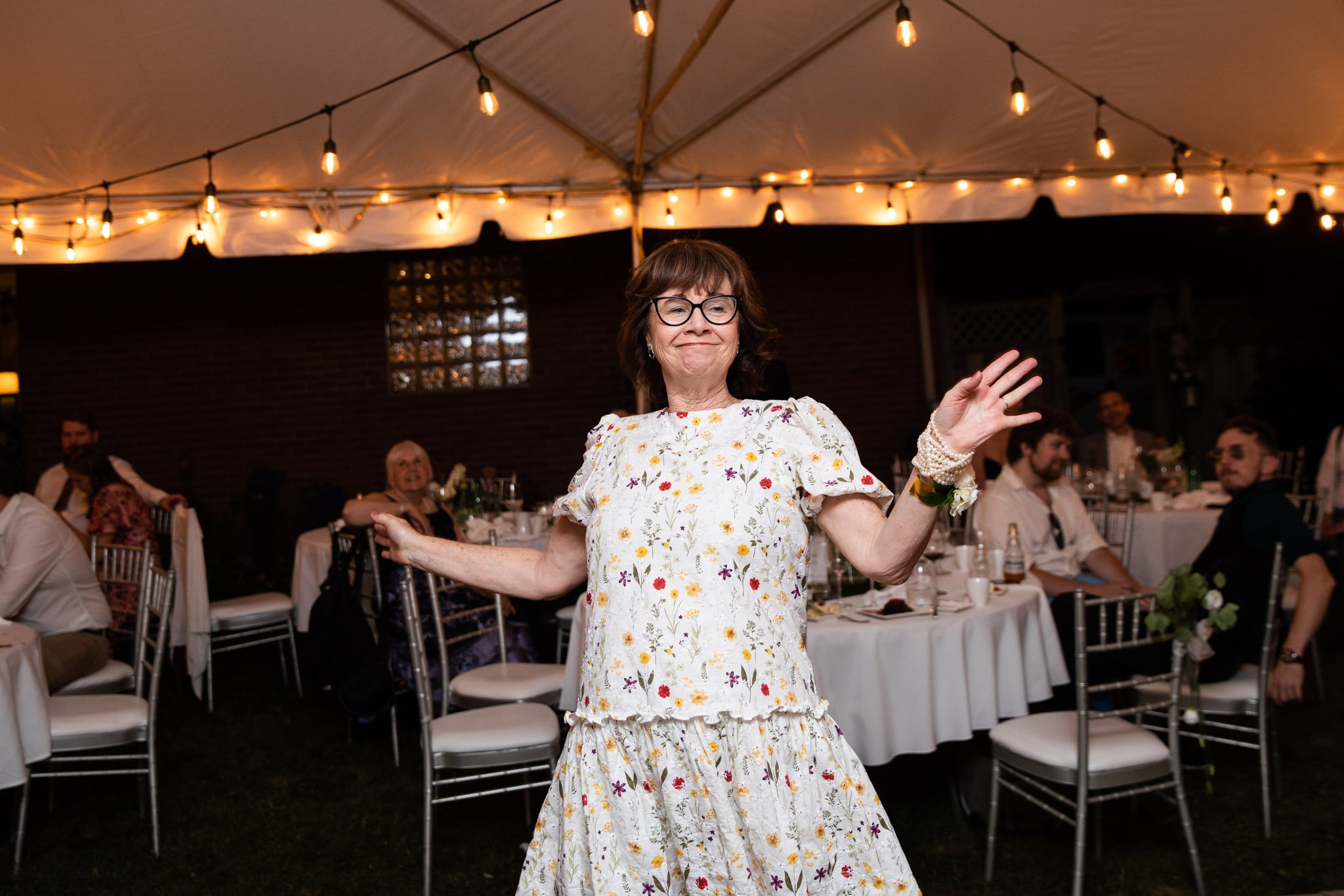 mother of the bride dancing during reception.jpg