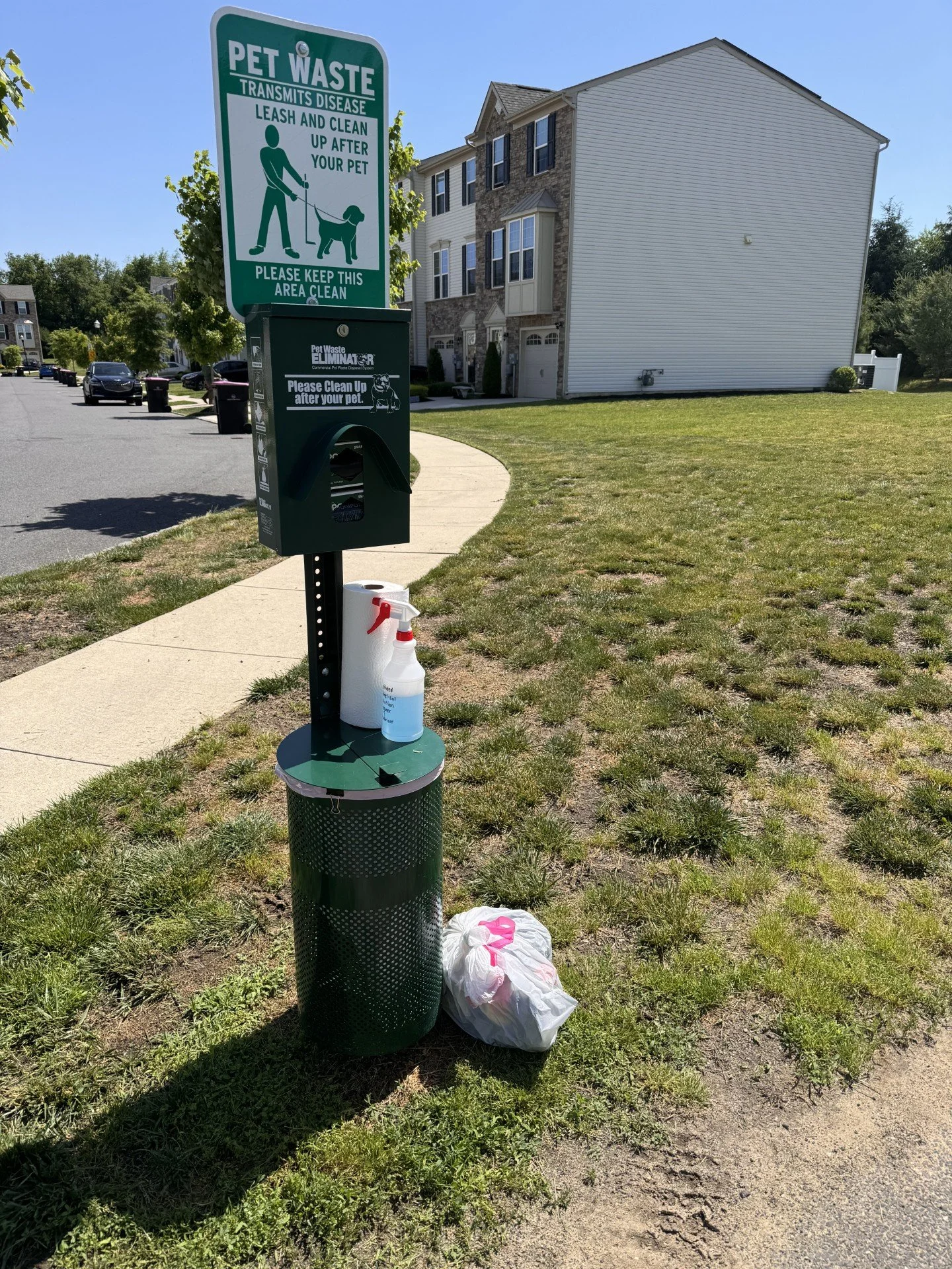 Pet waste removal for a community property