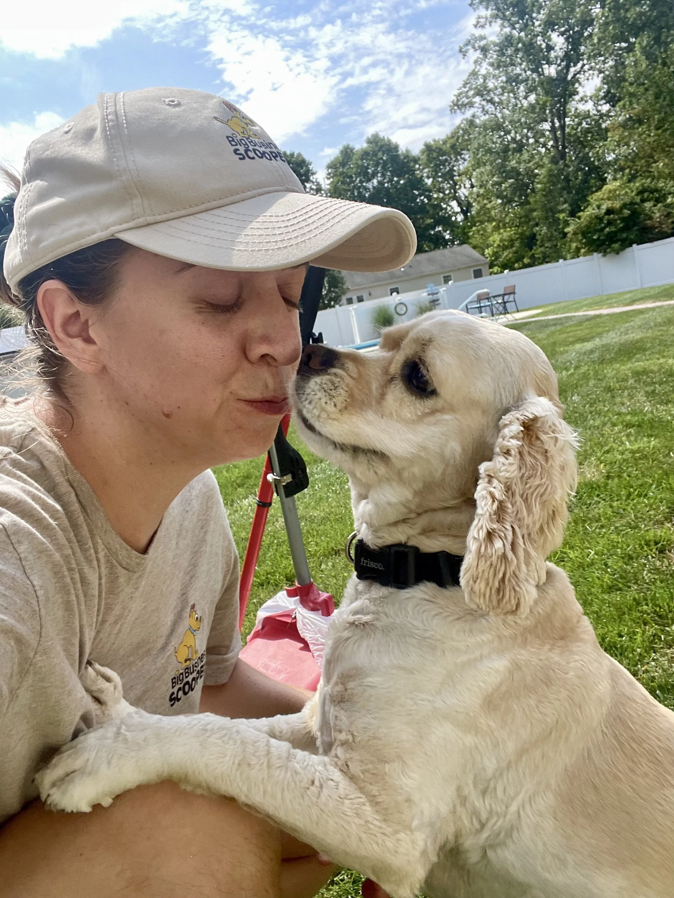 Emily with a happy client dog