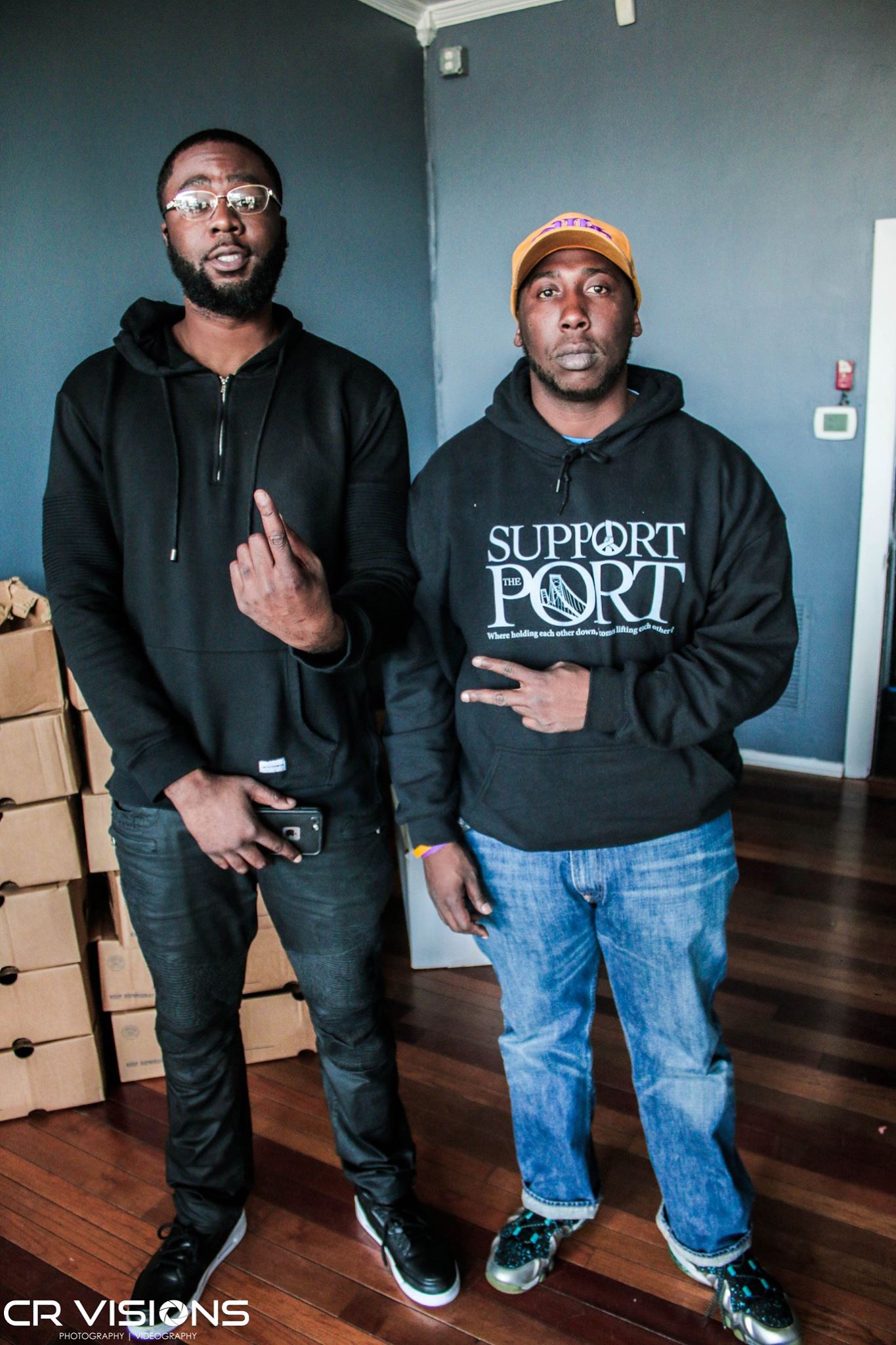 Devante BloodWorth Owner of On The Edge Barber & Cedric Harrison Exec Director of Support The Port Foundation, Inc. Posing for The Camera during Turkey Bowl Tuesday (Free Turkey Giveaway)