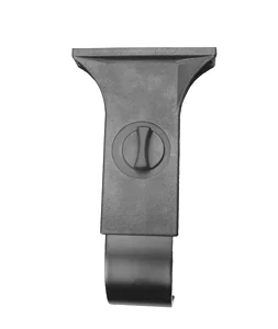 A close-up of a black surgical or utility scalpel handle with a screw for attaching blades.
