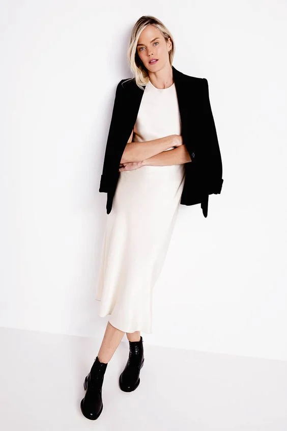 Dress and jacket from Anne Taylor. Note the boots to a sheer dress. Cool!