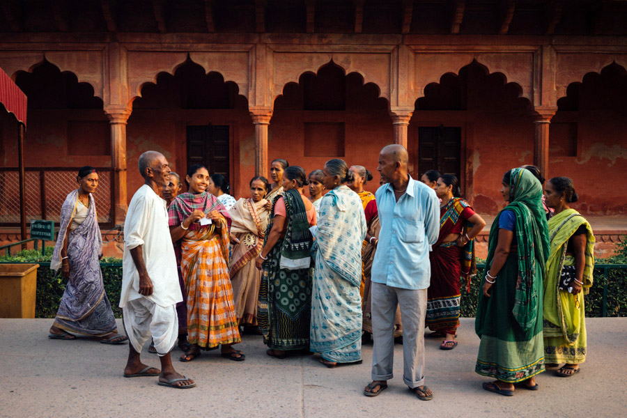 Groups gathering before the Taj Mahal.