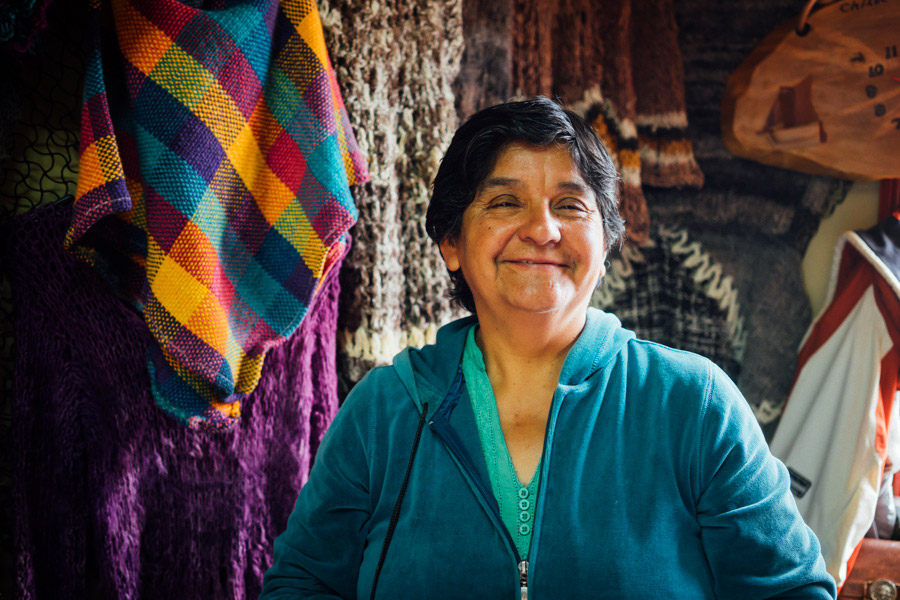  Just another smiling Chilean women. (We bought a pair of knitted wool mittens from her!) 