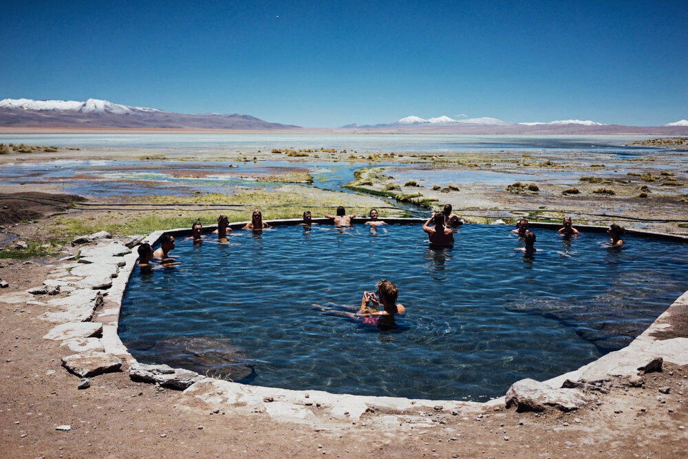  Through the beautiful Bolivian altiplano landscapes this was one of our first stops through the highlands: a thermal spring in the middle of the desert. With these views, we couldn’t resist taking a dip. 