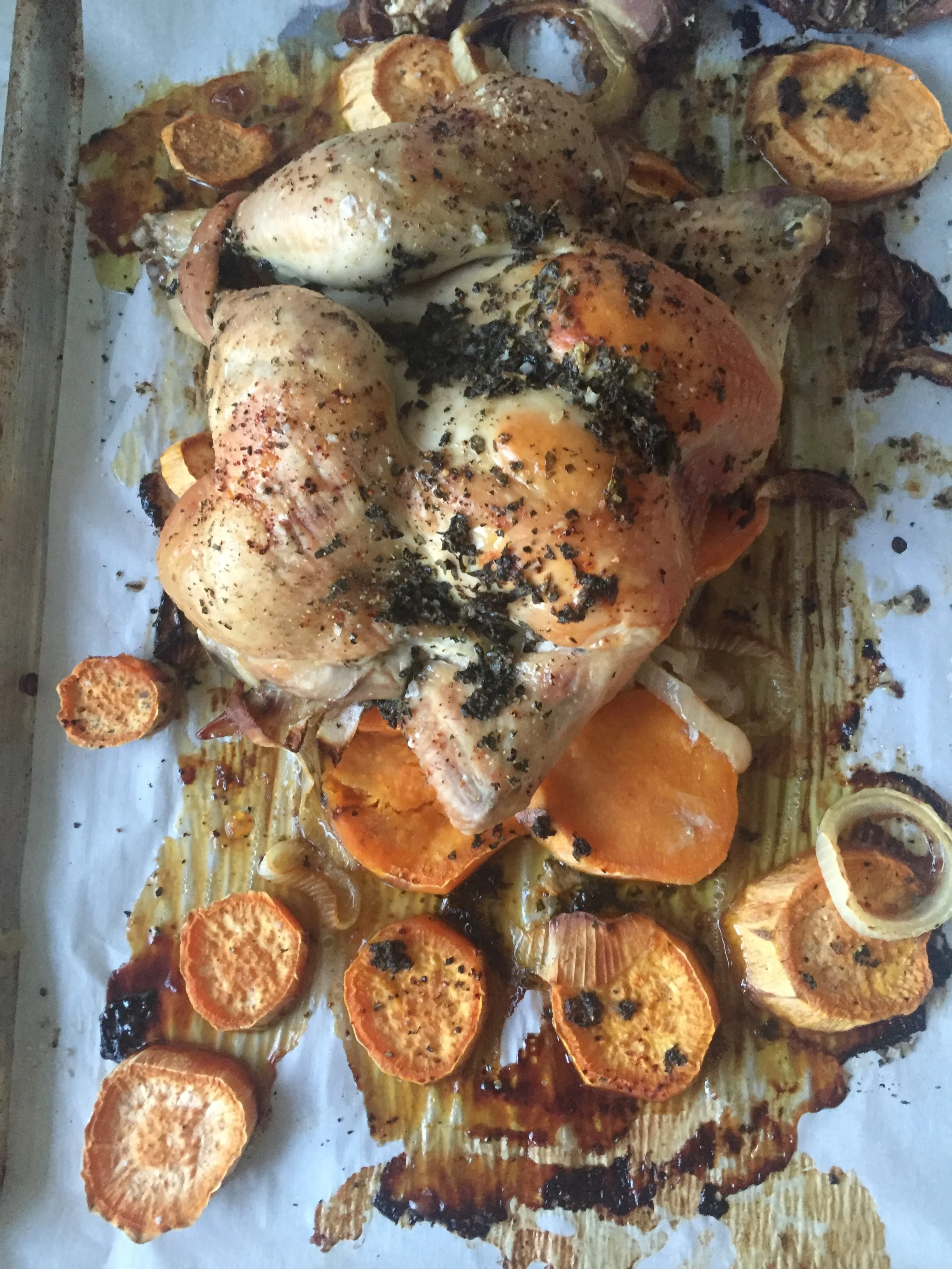 Pardon the horrible picture, but I just wanted you to see how plump and huge these chickens are from Family Cow Farmstand. Before putting it in the oven, I took out the backbone (just slice down either side of the spine with a sharp knife) and split the chicken open so that it would cook faster (about 1 hour and 15 minutes) and so that the skin would be super puffed and crispy (it was, yum). I also slathered it in softened butter mixed with finely chopped fresh oregano, salt, pepper, and a little lemon zest. The whole thing got laid on a bed of sweet potatoes and sweet onions. I roasted it in a super hot oven (450F) for 15 minutes then turned it down to 375F. Prep time - 10 minutes. While it cooked, I ran some errands, weeded a raised bed and planted a whole tray of annuals. How easy is that? 