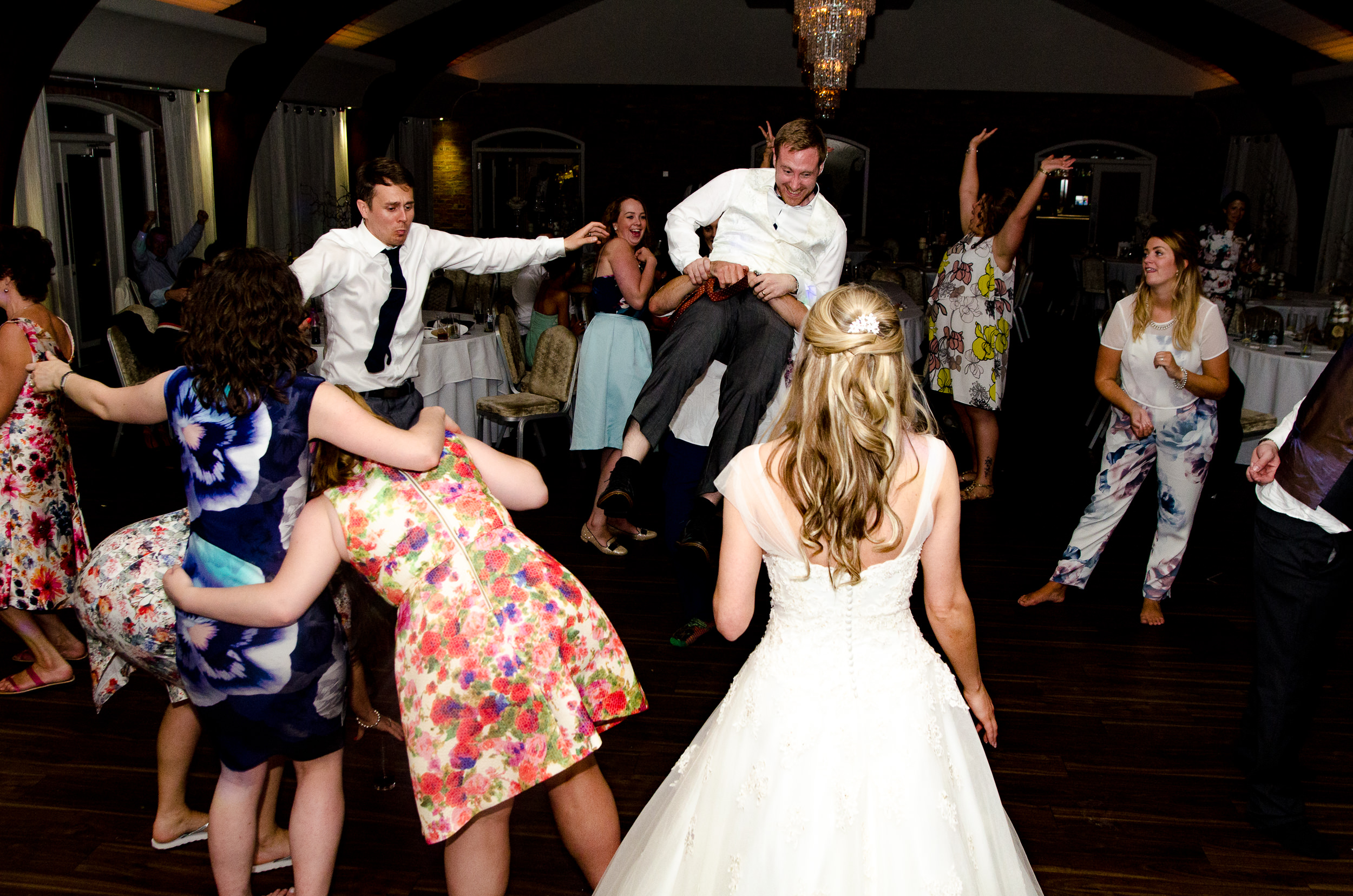 Picking the groom up.