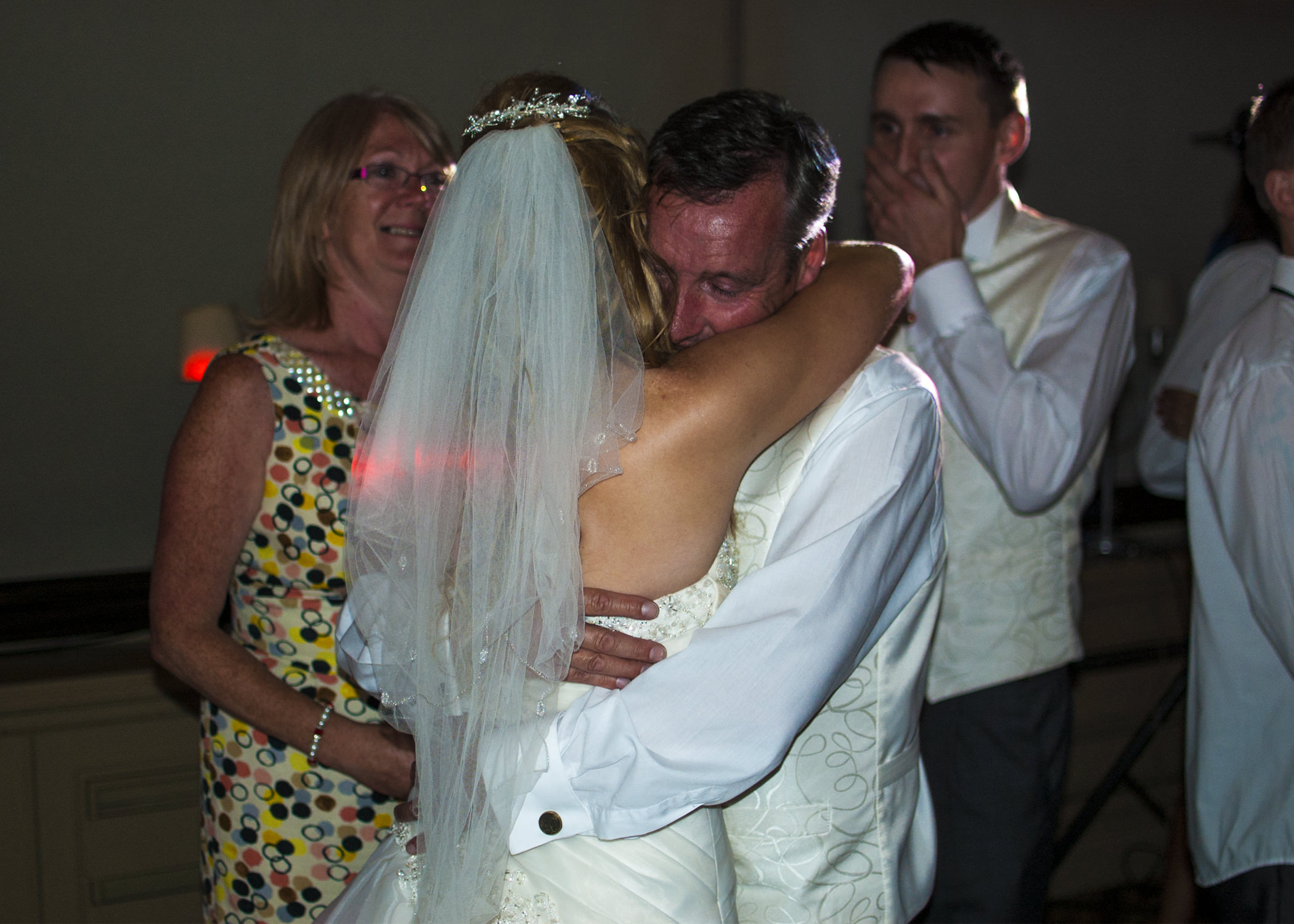 Dad's reaction. Groom's face says it all.