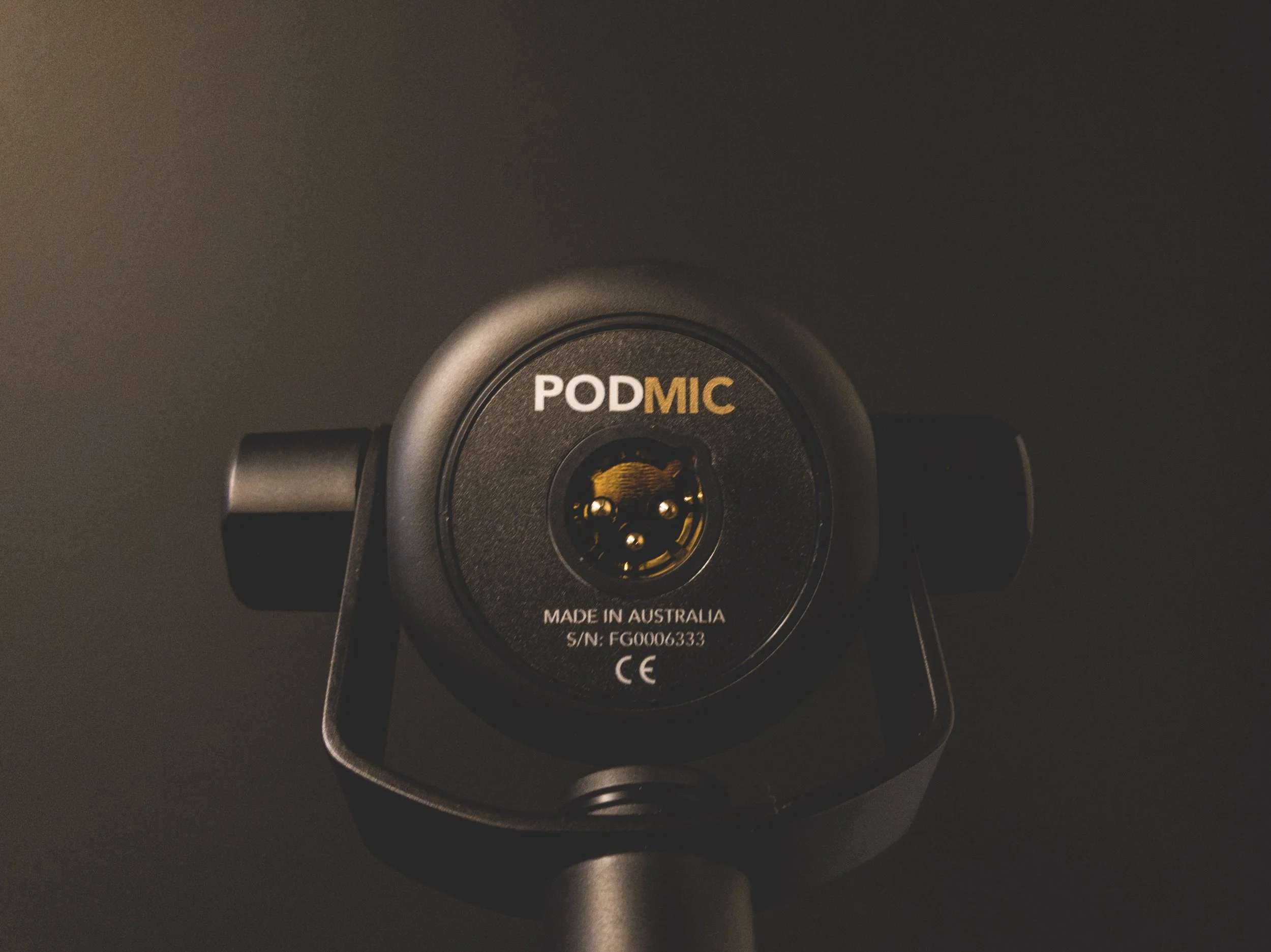 The back of the Rode Podmic XLR Micrphone showing the XLR jack.