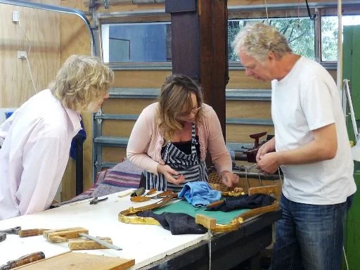 Students learning restoration techniques