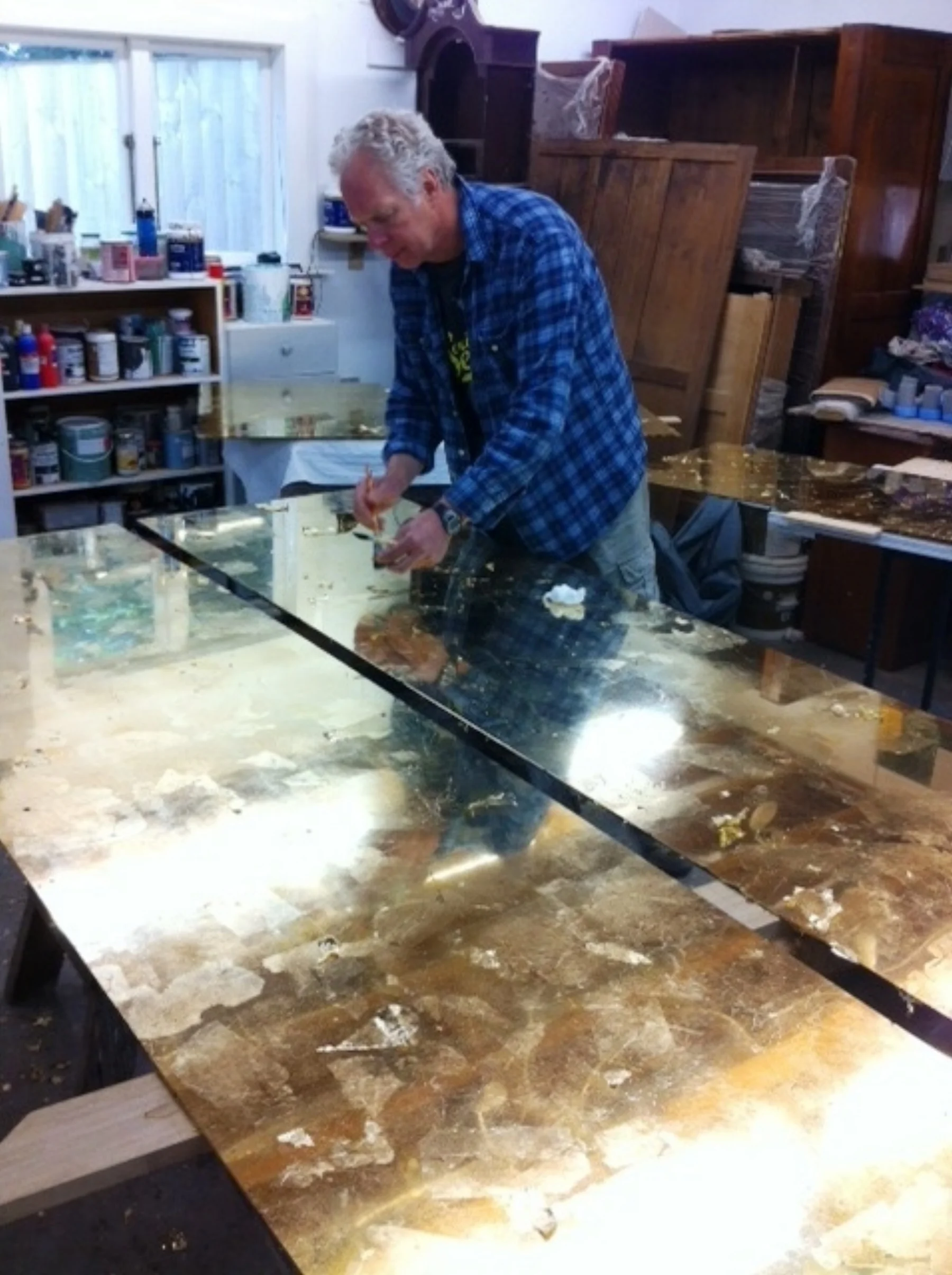 Gold leaf on glass panels for Sky City Casino. This gives the space a rich and glamorous appearance. &nbsp;