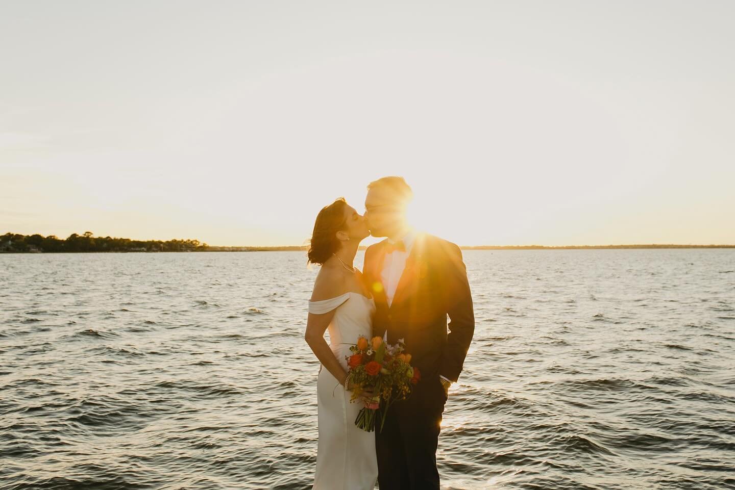They eloped in his parent&rsquo;s backyard with their pup, Sully and their closest family + friends. Then they shared snacks, laughter and drinks together on the back porch. And we ended the night catching the roaring sunset at the yacht club around 