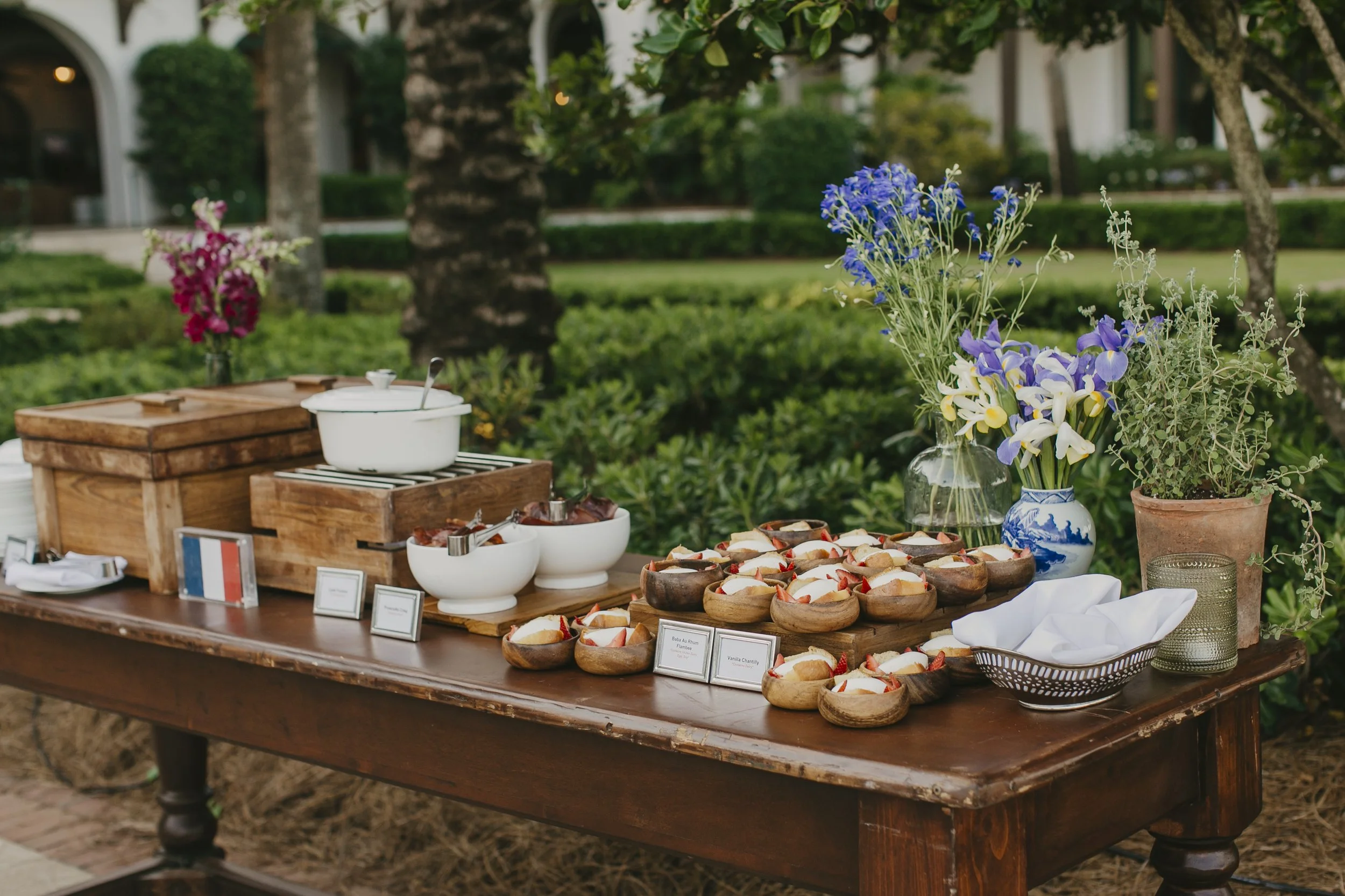 Garden reception food station with fresh flowers at Sea Island Resort during a corporate conference