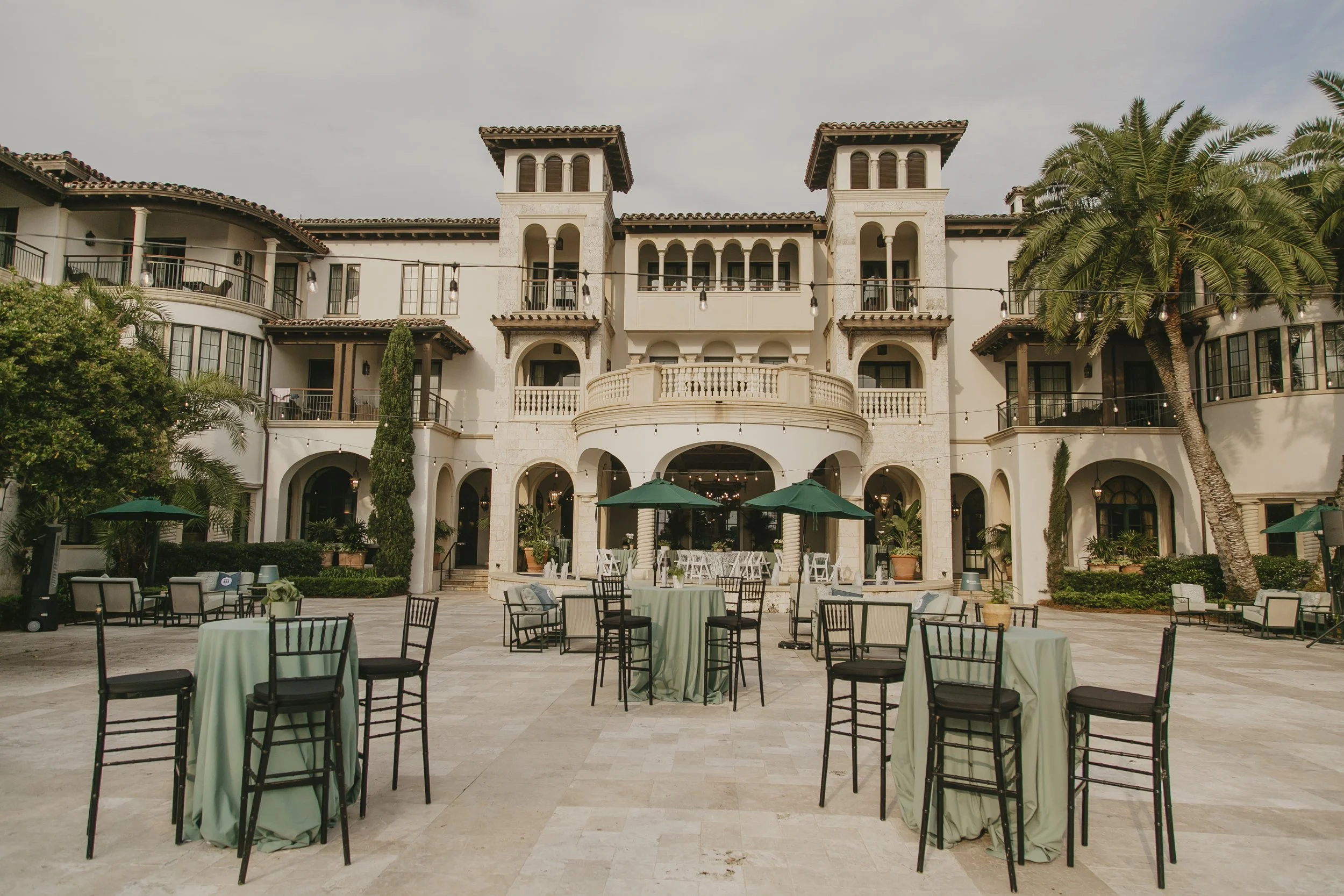Terrace at The Cloister at Sea Island set with cocktail tables for a corporate conference reception