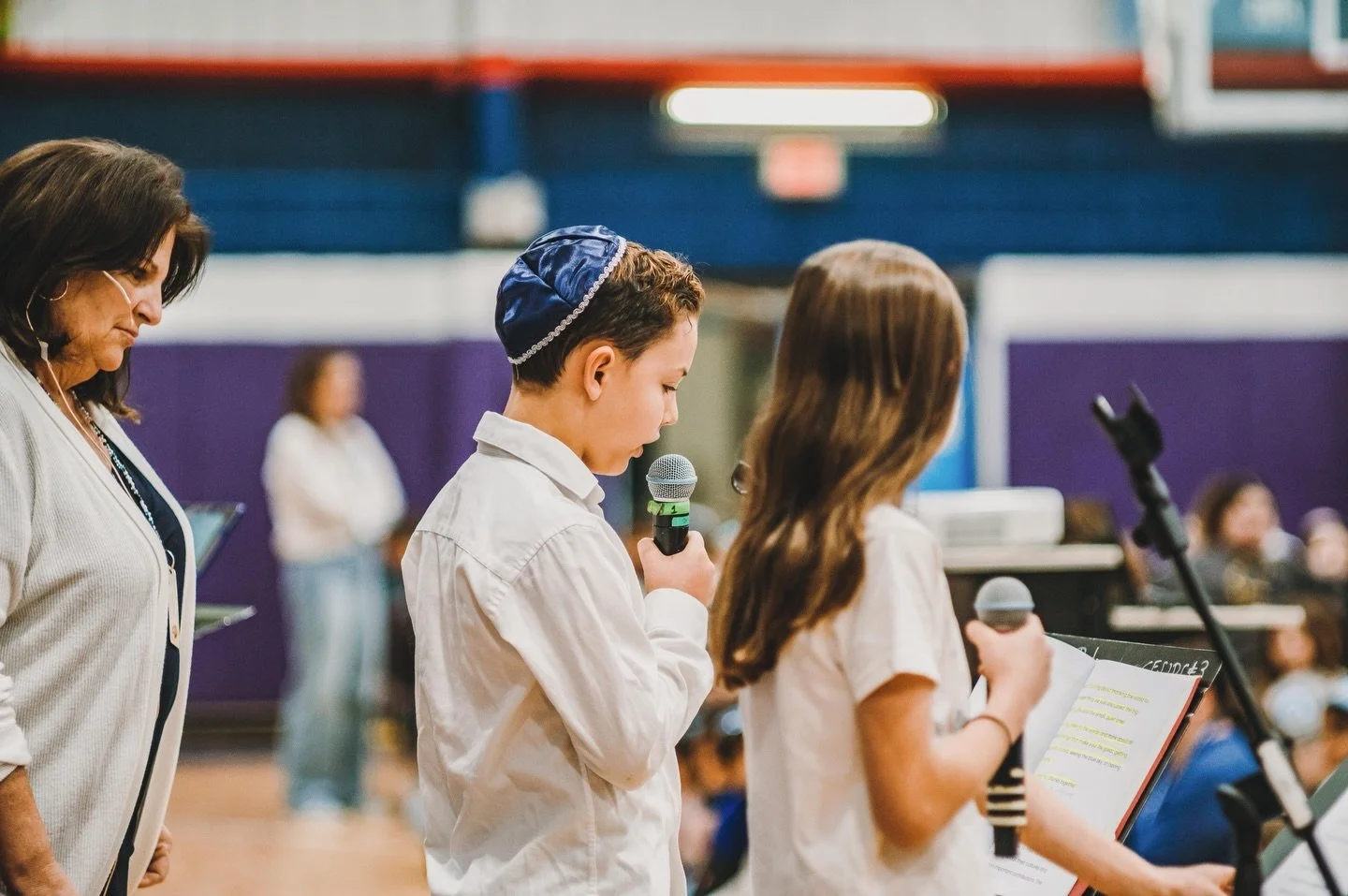 Inclusion means all children have the opportunity to actively participate in school programs-Sulam@JDS student leads the school morning meeting with confidence.

📸 @jrushphoto 

#community #inclusion #sulam #jewisheducation