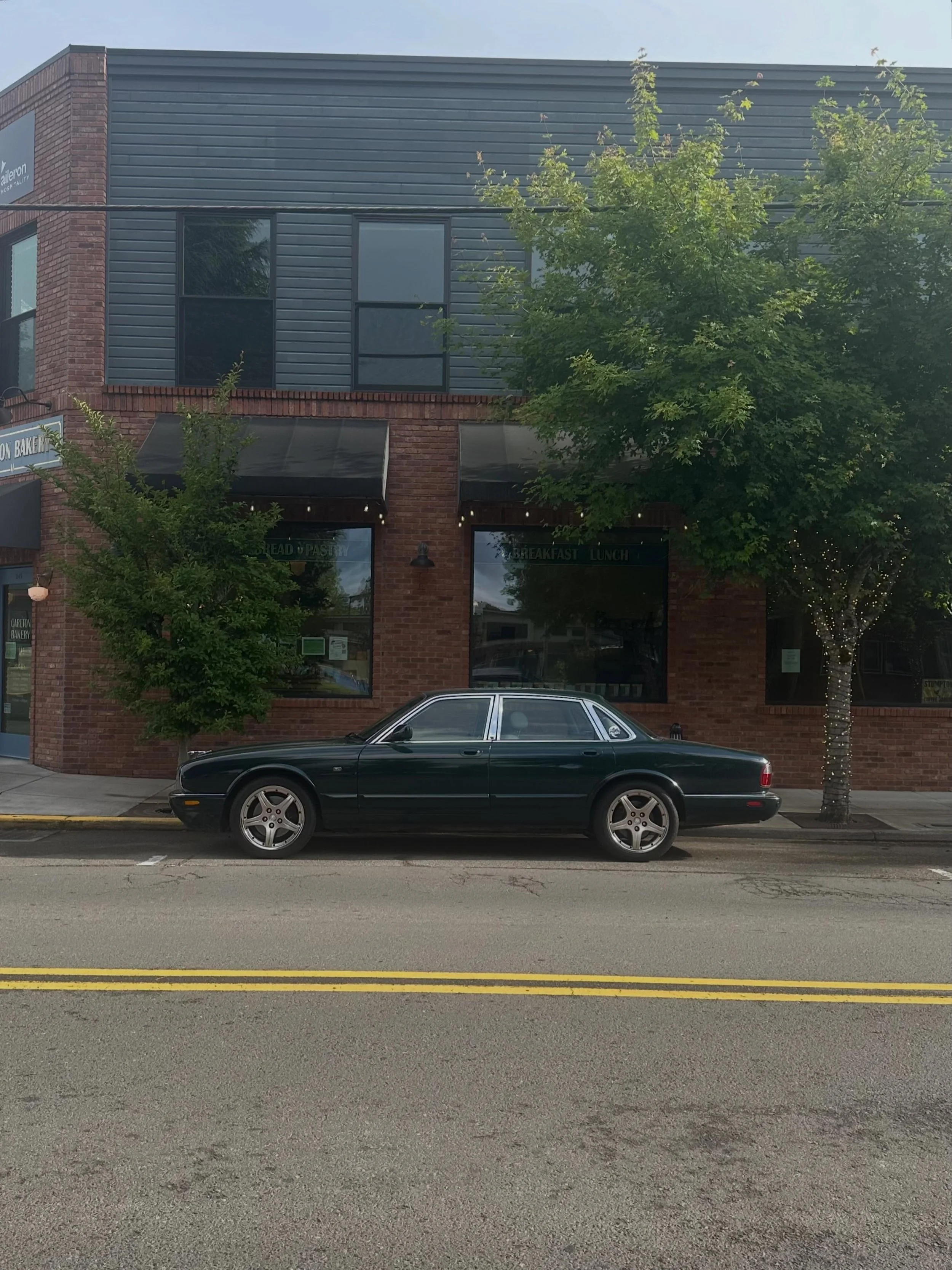 Morning pastry run in the Jag