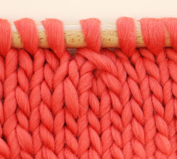 The double left leaning decrease - allows to decrease 2 stitches at once. The first stitch, on the right, leans to the left and is placed above the 2nd and 3rd stitches.