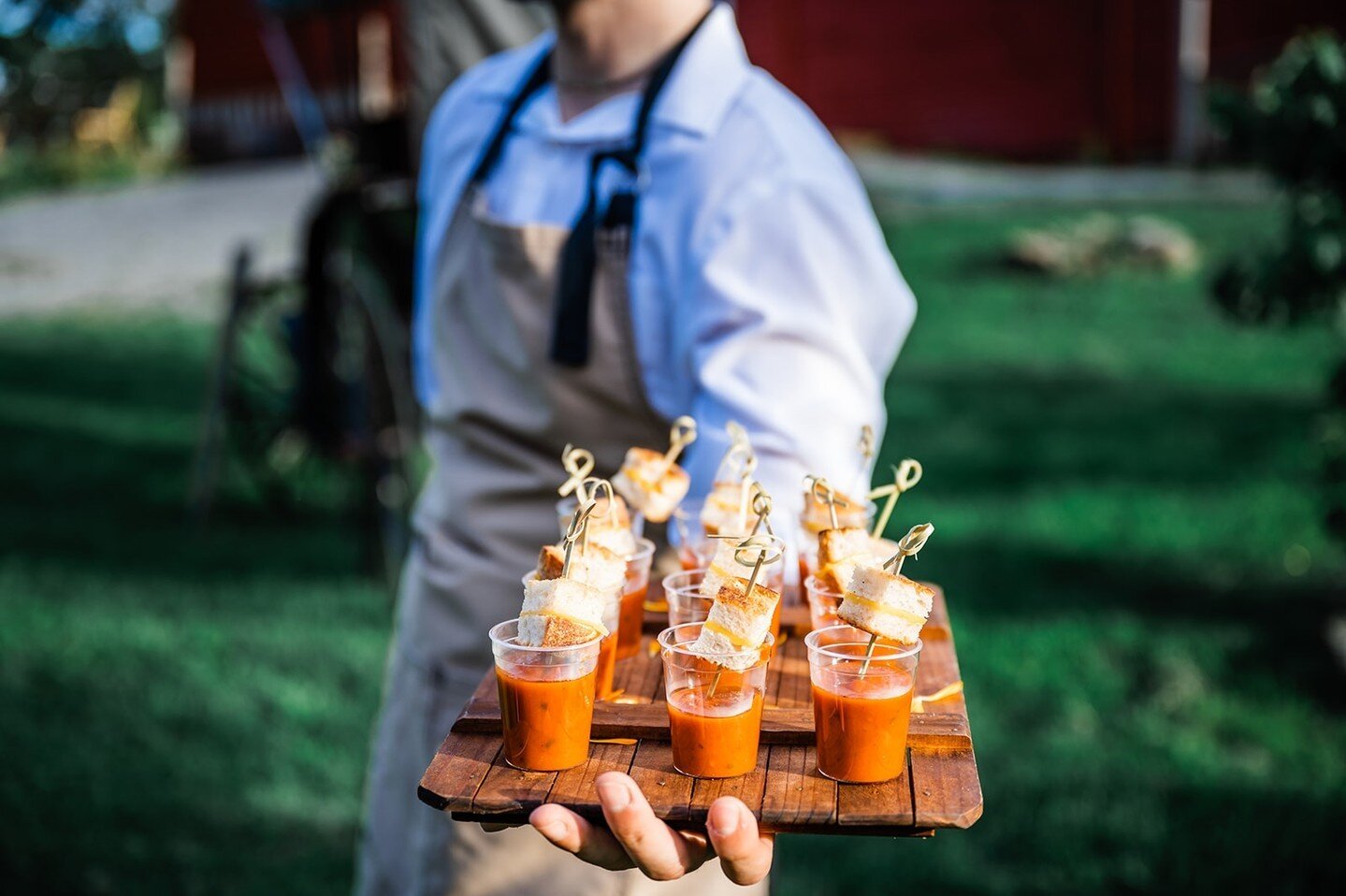 Farm to table wedding! At Blenheim, we grow most of our own ingredients, and some greens are harvested just minutes before your wedding reception. Here are heirloom tomato shooters with grilled cheese for cocktail hour.⁠
Photographer: Kalz Photograph