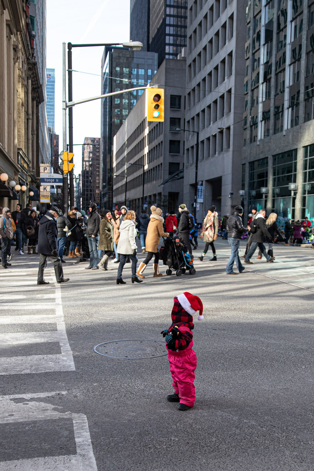  And this little girl looking around wonder what the delay is for the parade.  