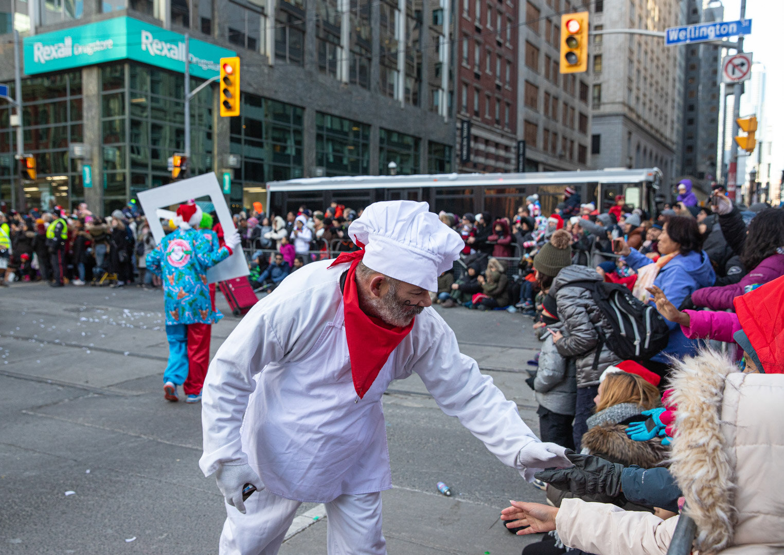  A Baker giving the kids hi-fives  