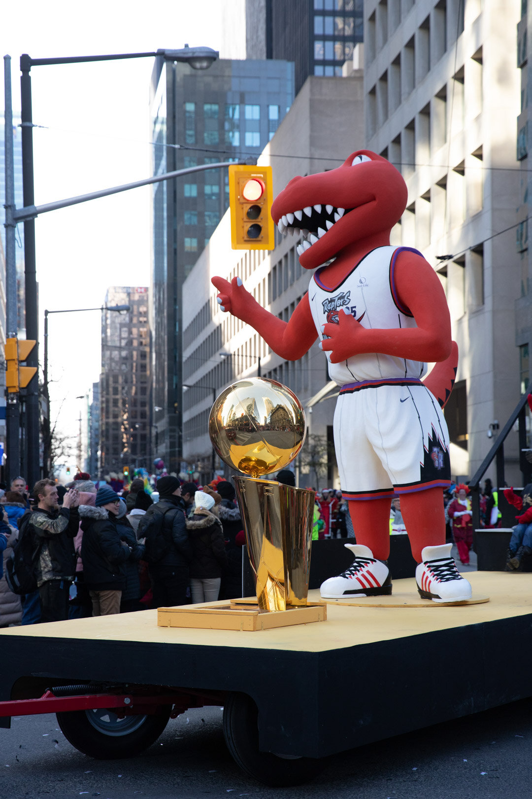  At the front of this float is the Larry O'Brien Championship Trophy which the Toronto Raptors won this past spring.  