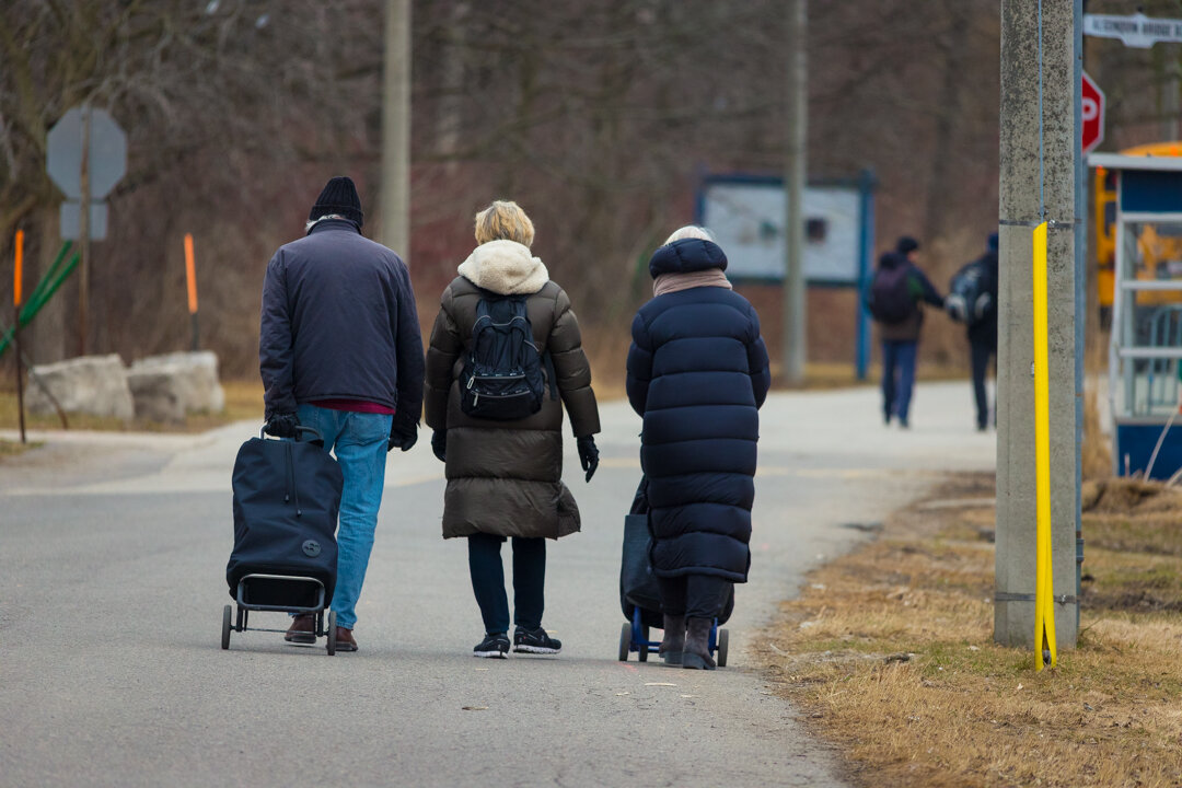  Some Islander residents walking along Cibola Avenue.  On March 11th, the World Health Organization declared the outbreak of The Coronavirus a pandemic. Top officials and healthcare professionals from around the world recommended physically distancin